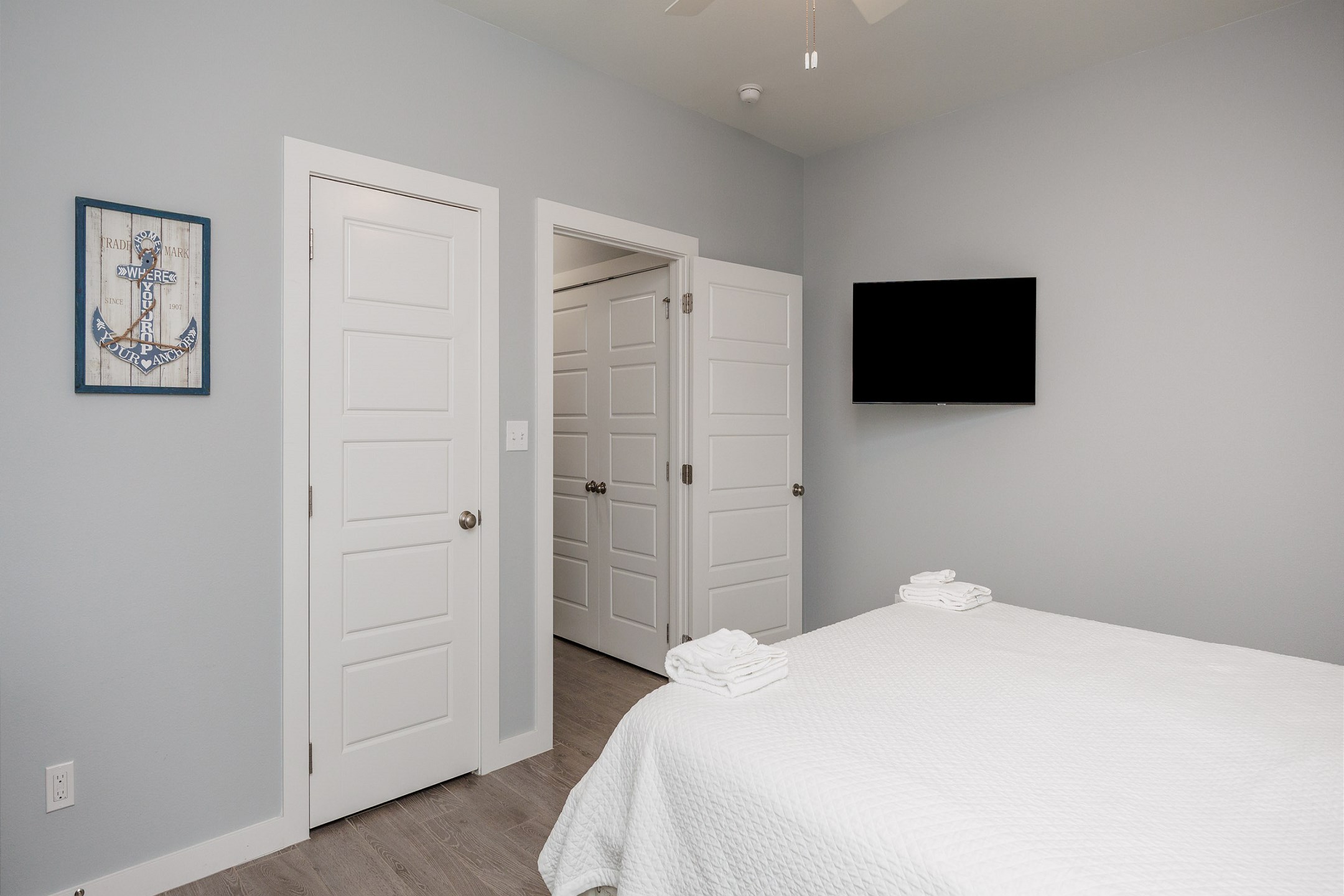 Master bedroom on the first floor with king size bed, private bathroom and flat screen TV