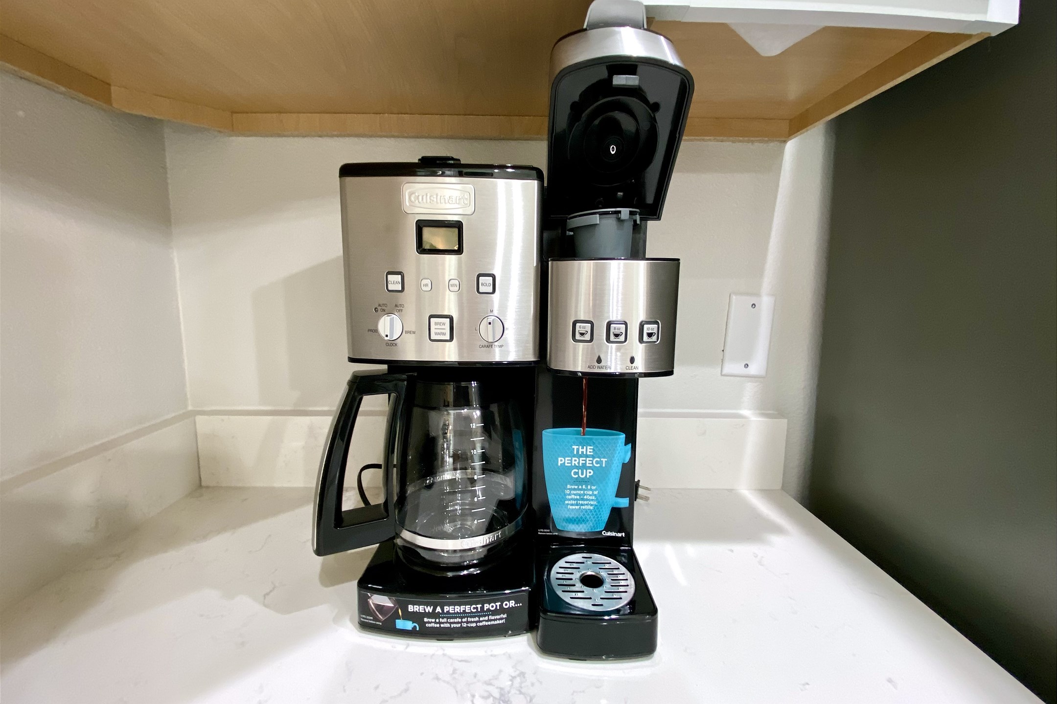 Toaster, cookware, dinnerware, and other kitchen essentials provided, including this Keurig/standard coffee maker combo 
