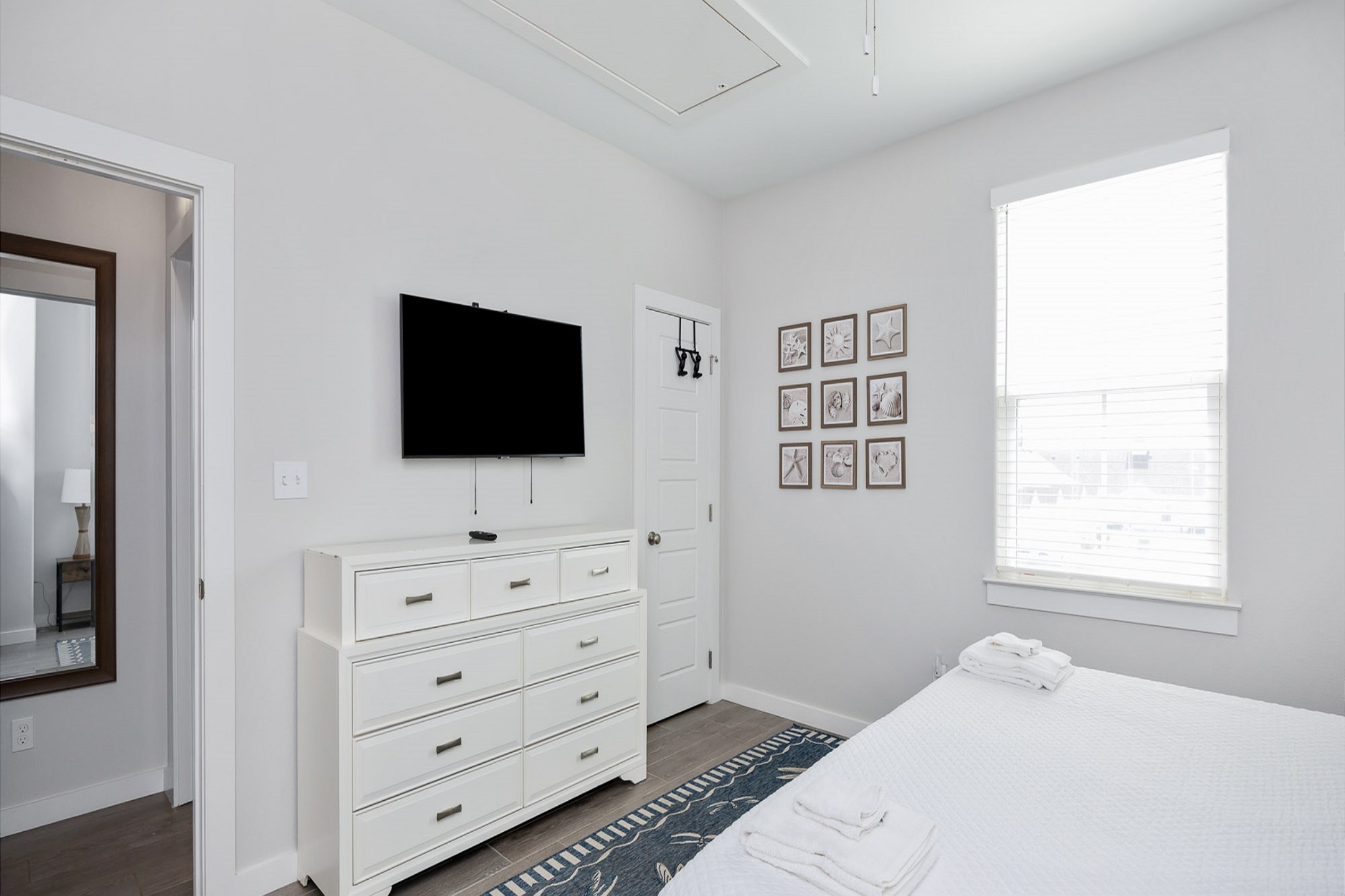 Second bedroom on the second floor with king size bed and flat screen TV