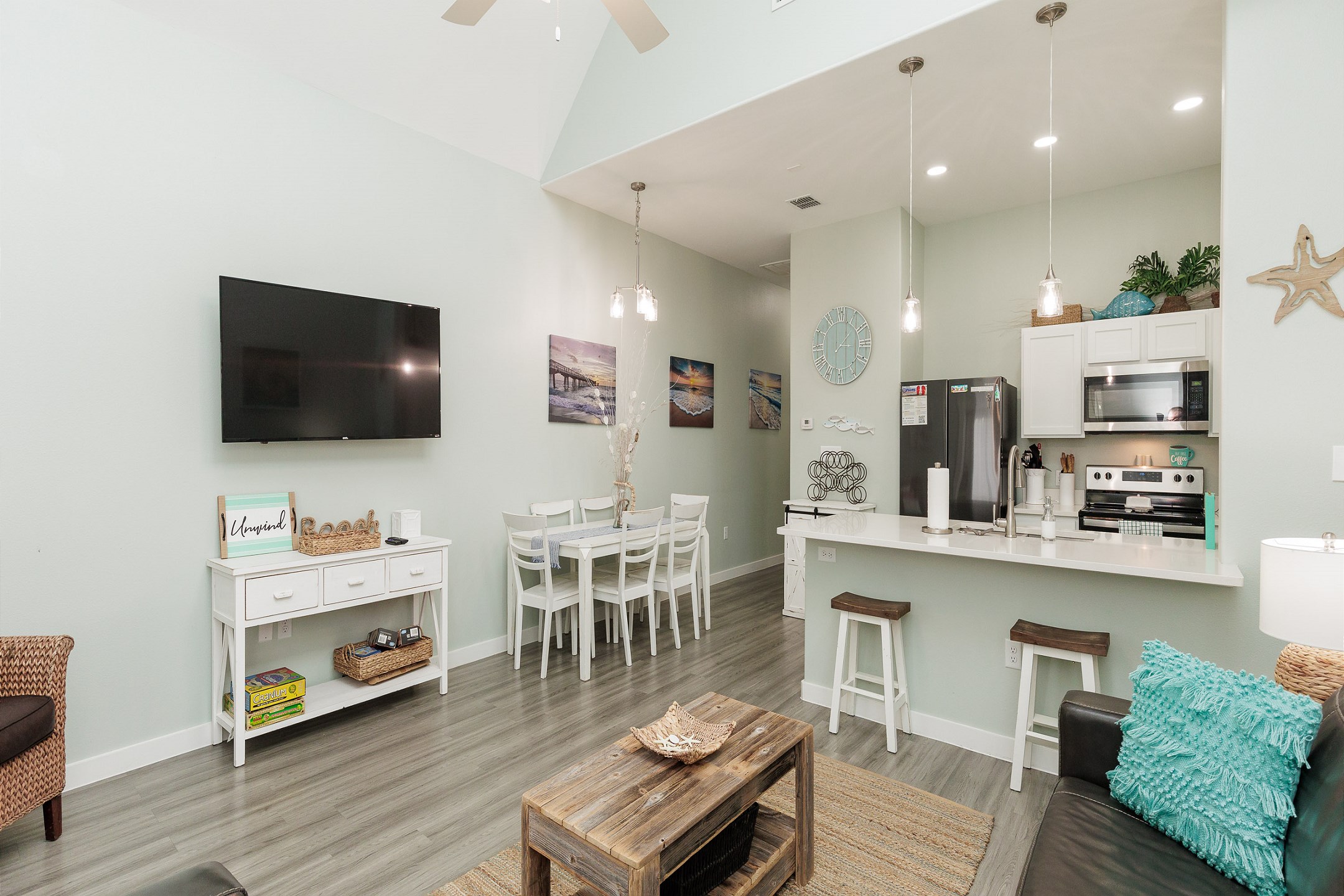 Versatile living area featuring a harmonious blend of comfort and style, ideal for both relaxation and entertaining