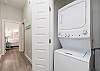 Stackable washer and dryer in unit