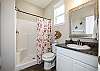 Second guest bathroom on the second floor with sink and walk in shower 