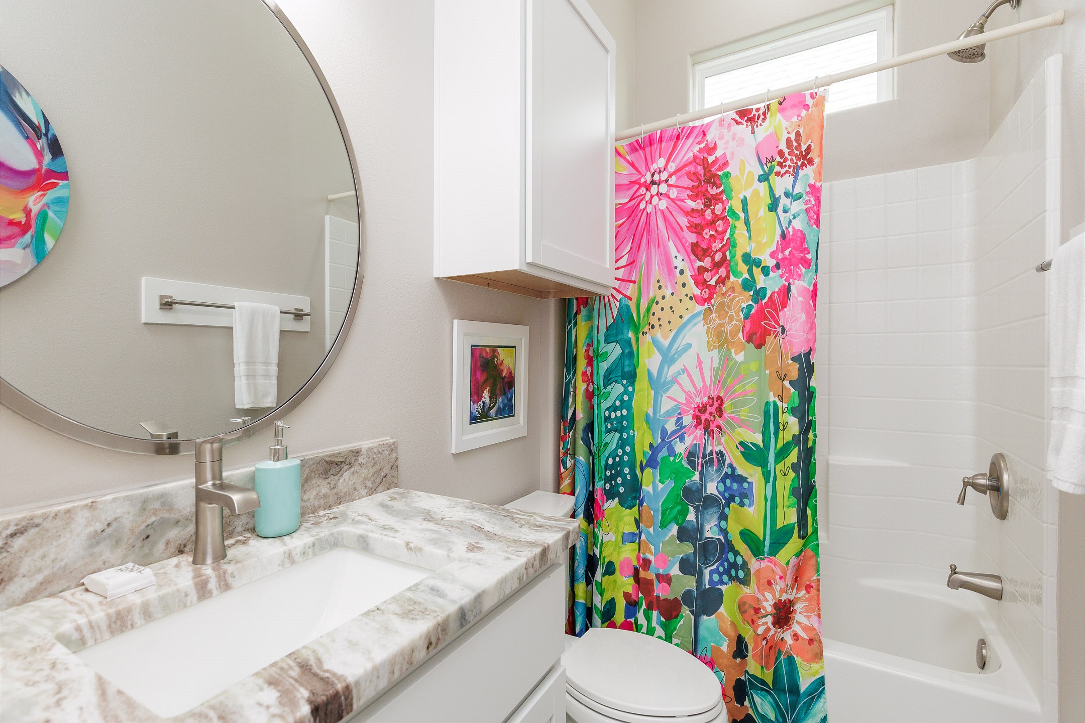 Guest bathroom with tub and shower combo