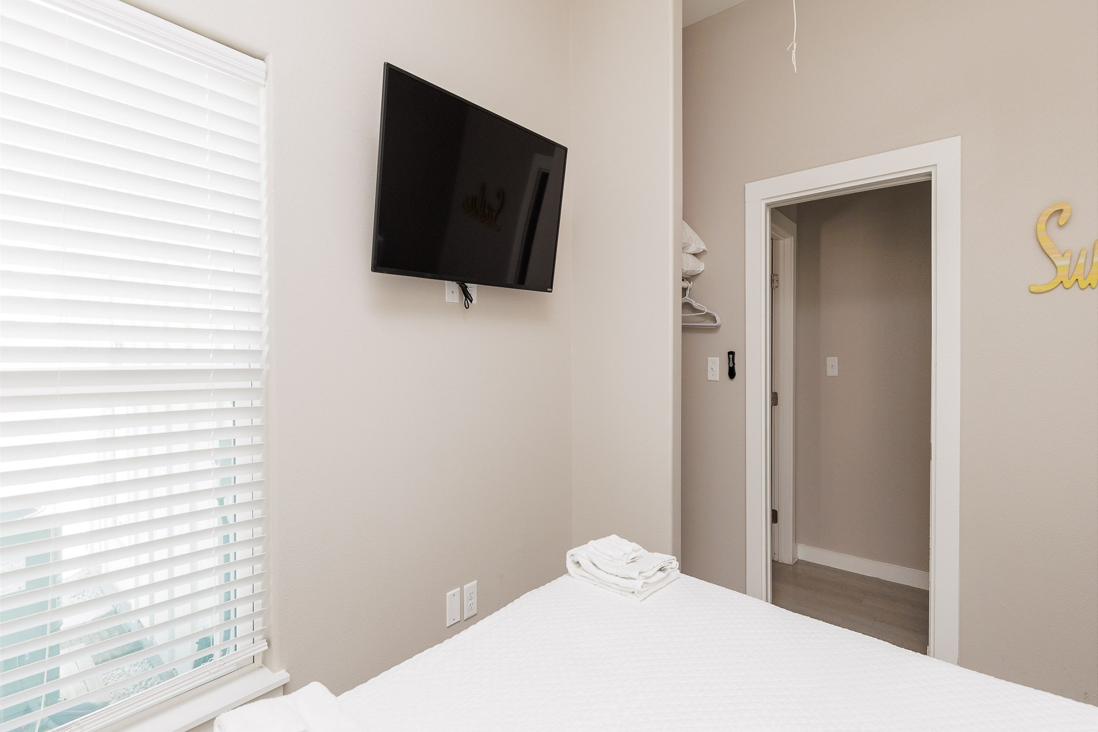 Second bedroom with queen size bed and flat screen TV