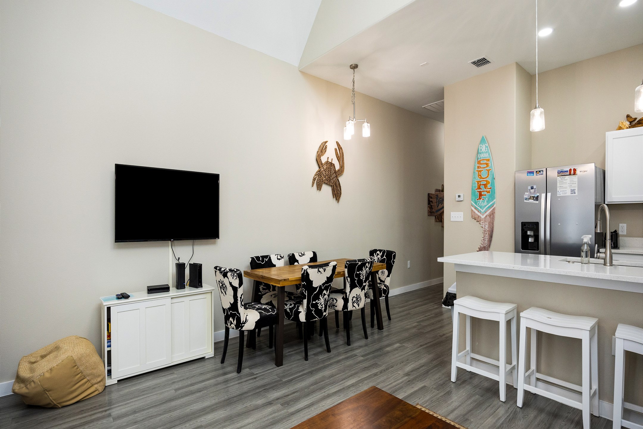 Inviting family hub with seamlessly integrated kitchen, dining, and living areas, perfect for creating lasting memories