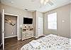 Third floor bedroom with king size bed and flat screen TV 