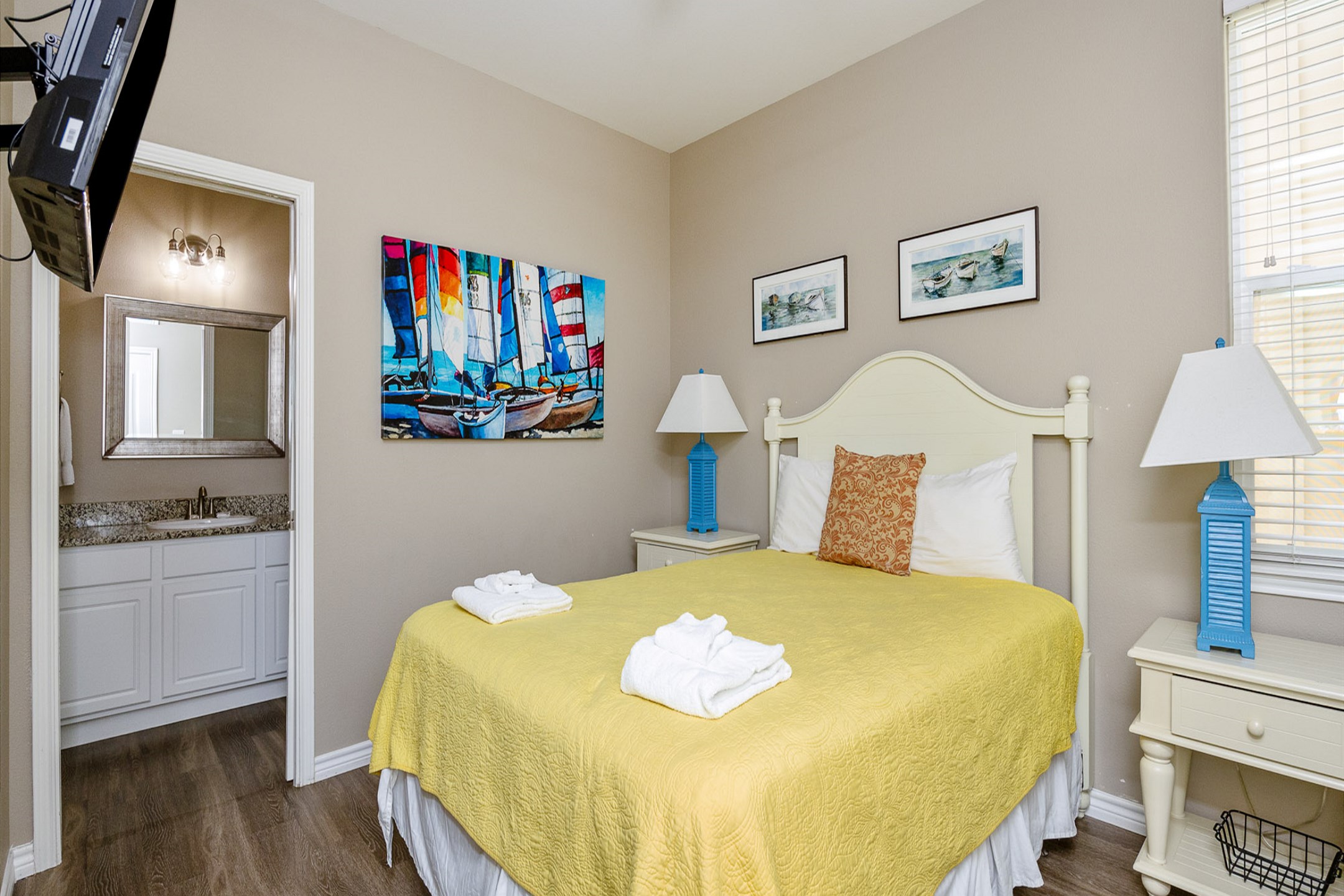 Third bedroom on the second floor with queen size bed, shared bathroom, private balcony and flat screen TV