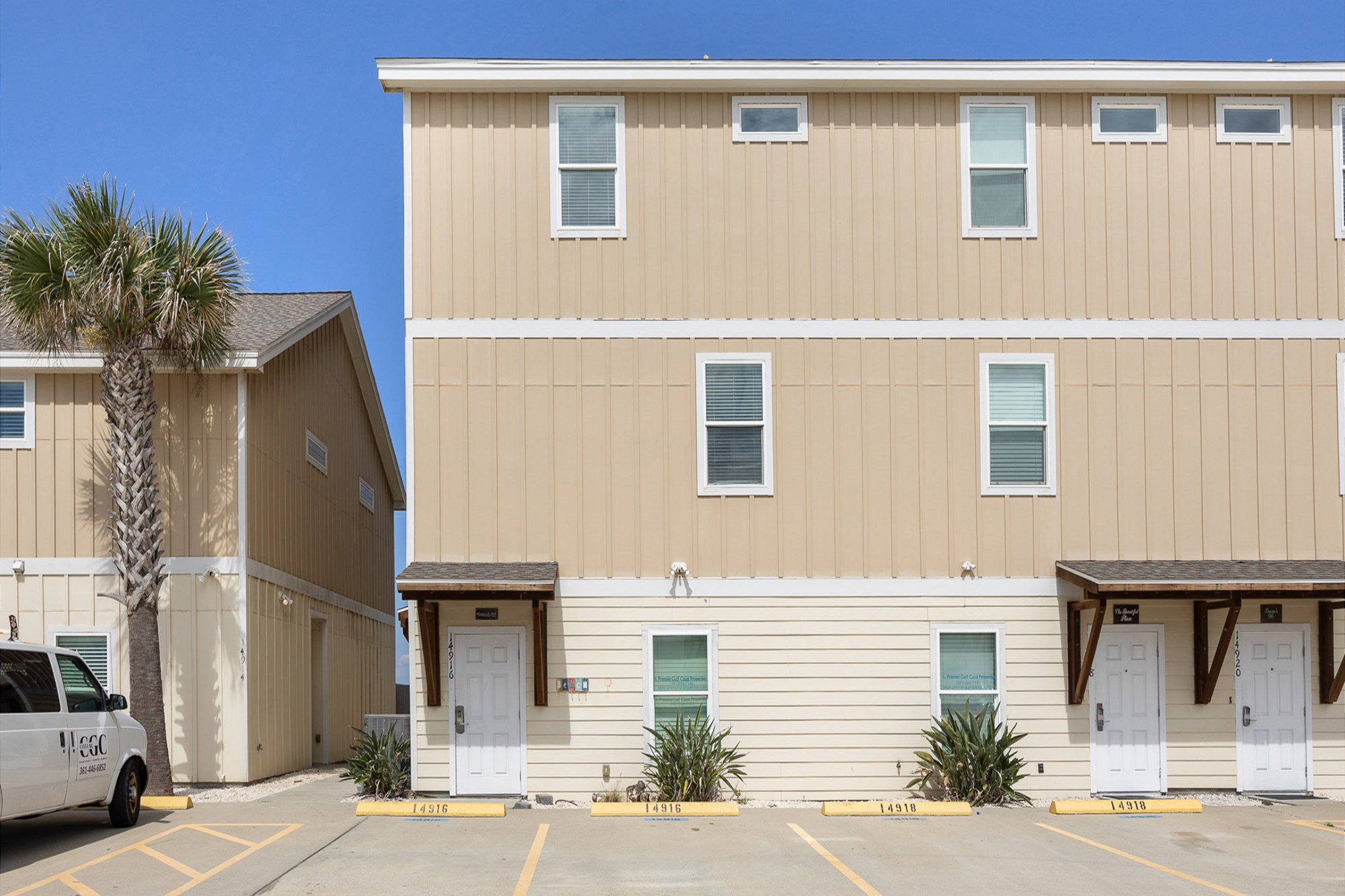 Front exterior of property with two assigned parking spaces 
