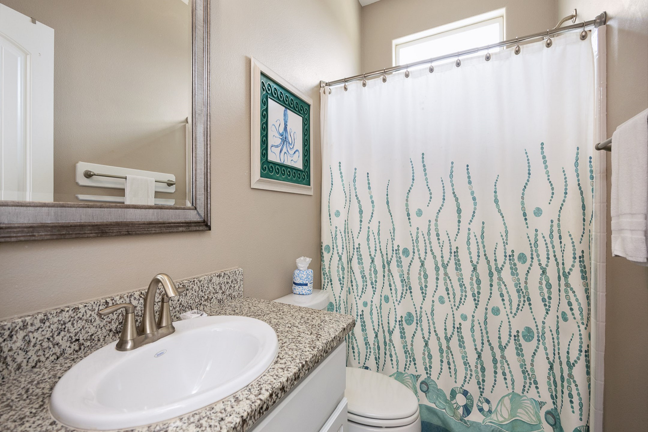 Master bathroom on the first floor with walk in shower