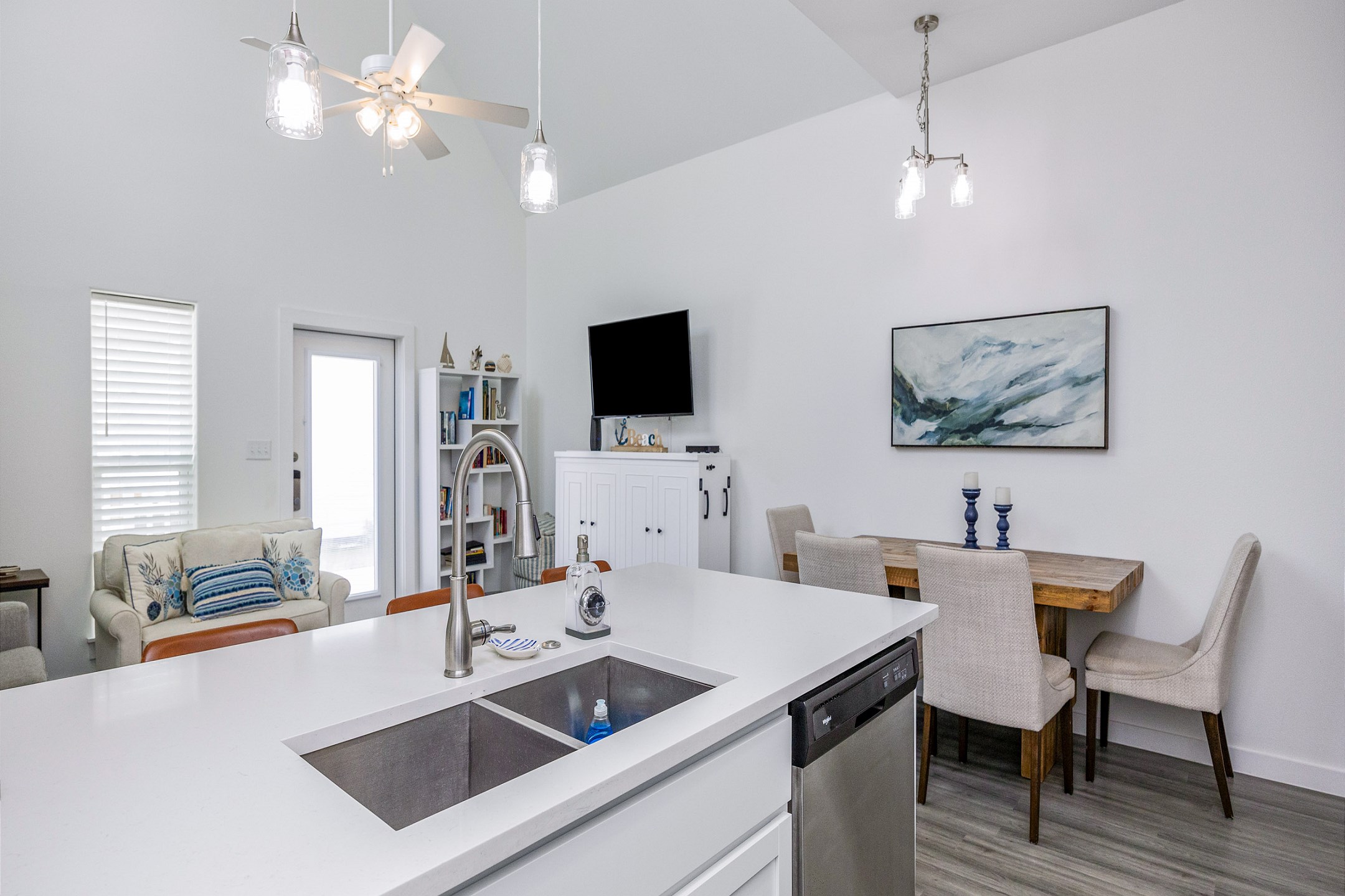 Open-concept layout connecting the dining area to the kitchen