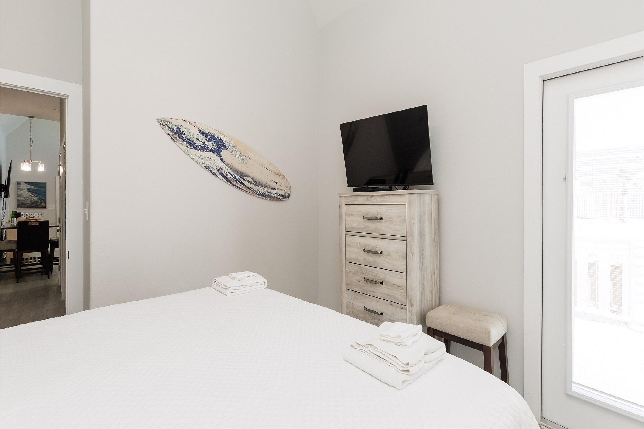 Master bedroom with king size bed, private bathroom and flat screen TV