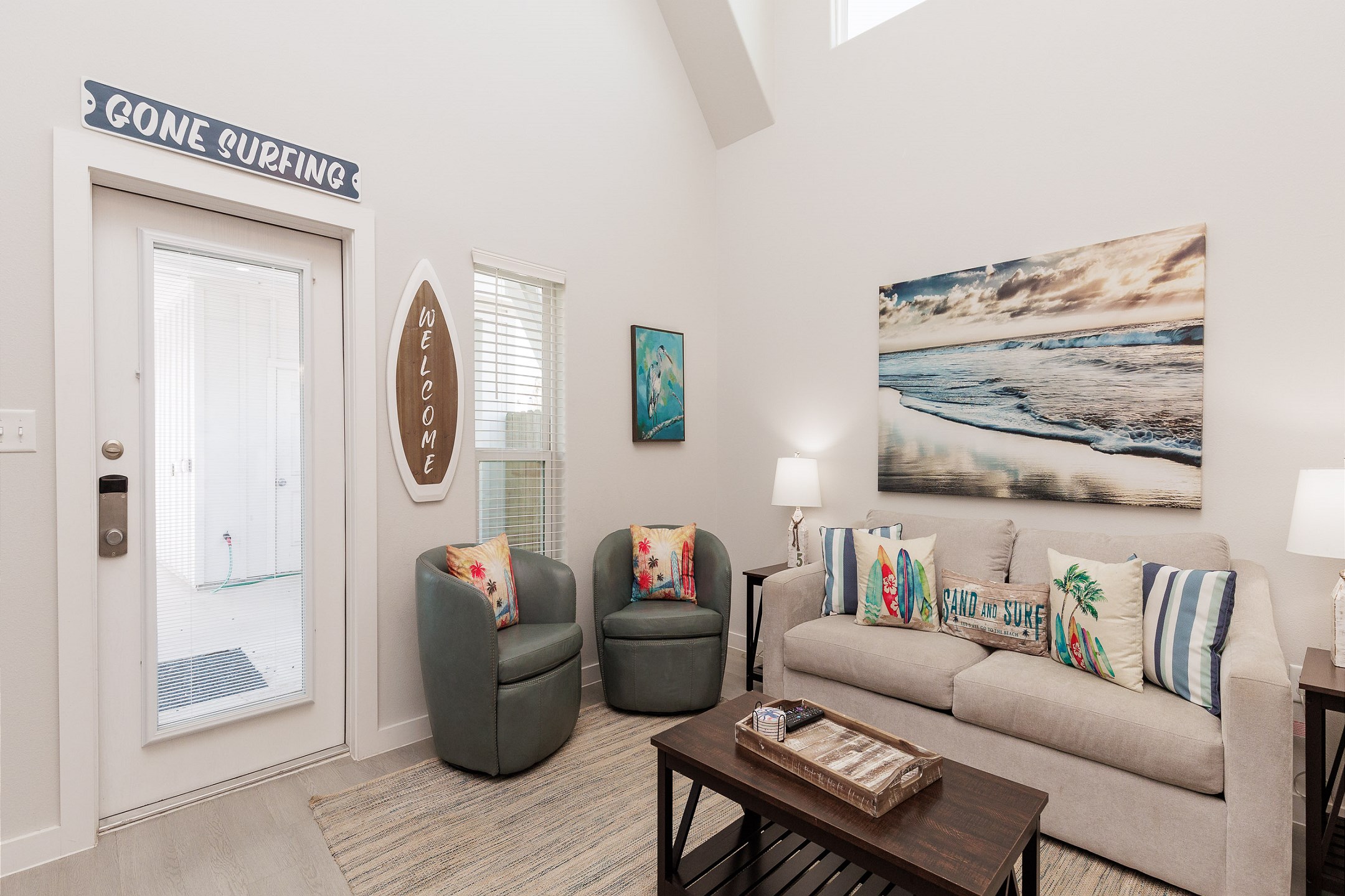 Open concept living area with relaxed seating and queen size sleeper sofa 