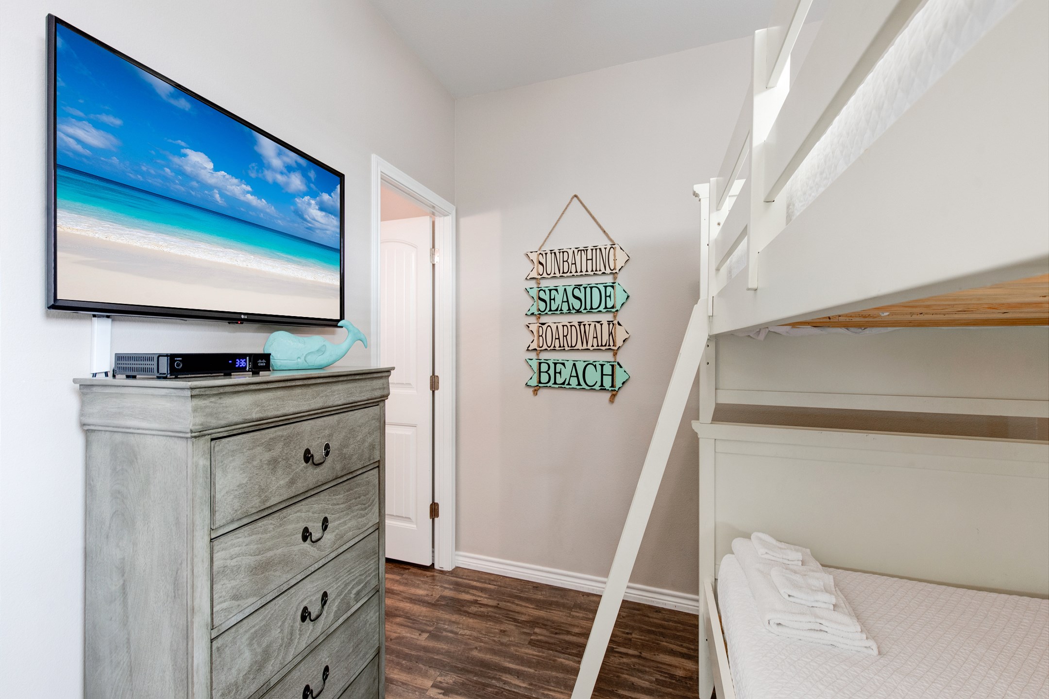 Second bedroom on second floor with twin over full size bunk bed with twin trundle and flat screen TV 