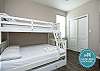 Guest bedroom on second floor with twin over full size bunk bed with twin trundle and flat screen TV 