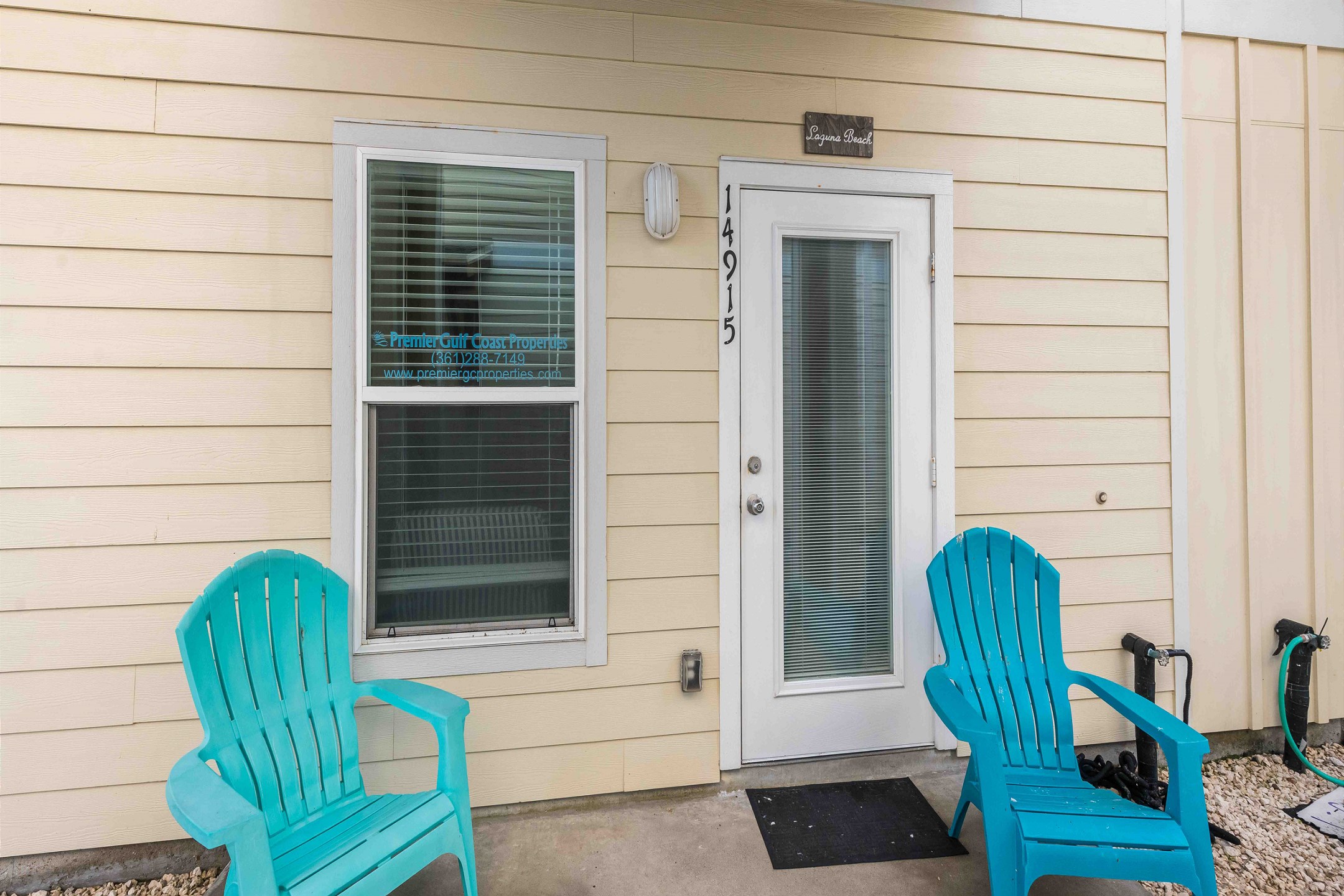 A private patio just off the living room provides easy access to the pool area, perfect for seamless indoor-outdoor living