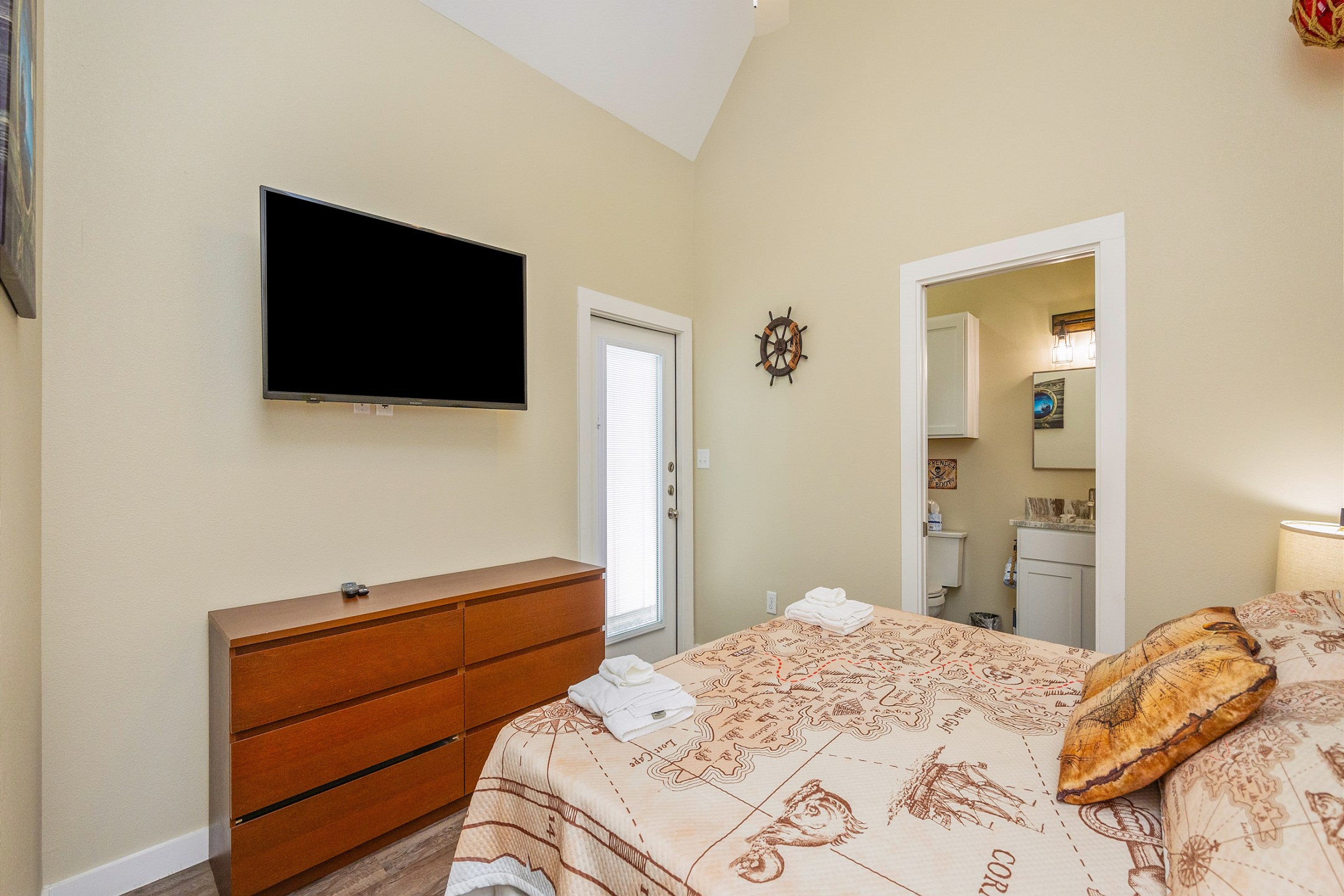 Master bedroom with king size bed, ensuite bathroom and flat screen TV