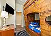 Second guest bedroom with twin over full size pirate ship bunk bed with flat screen TV 