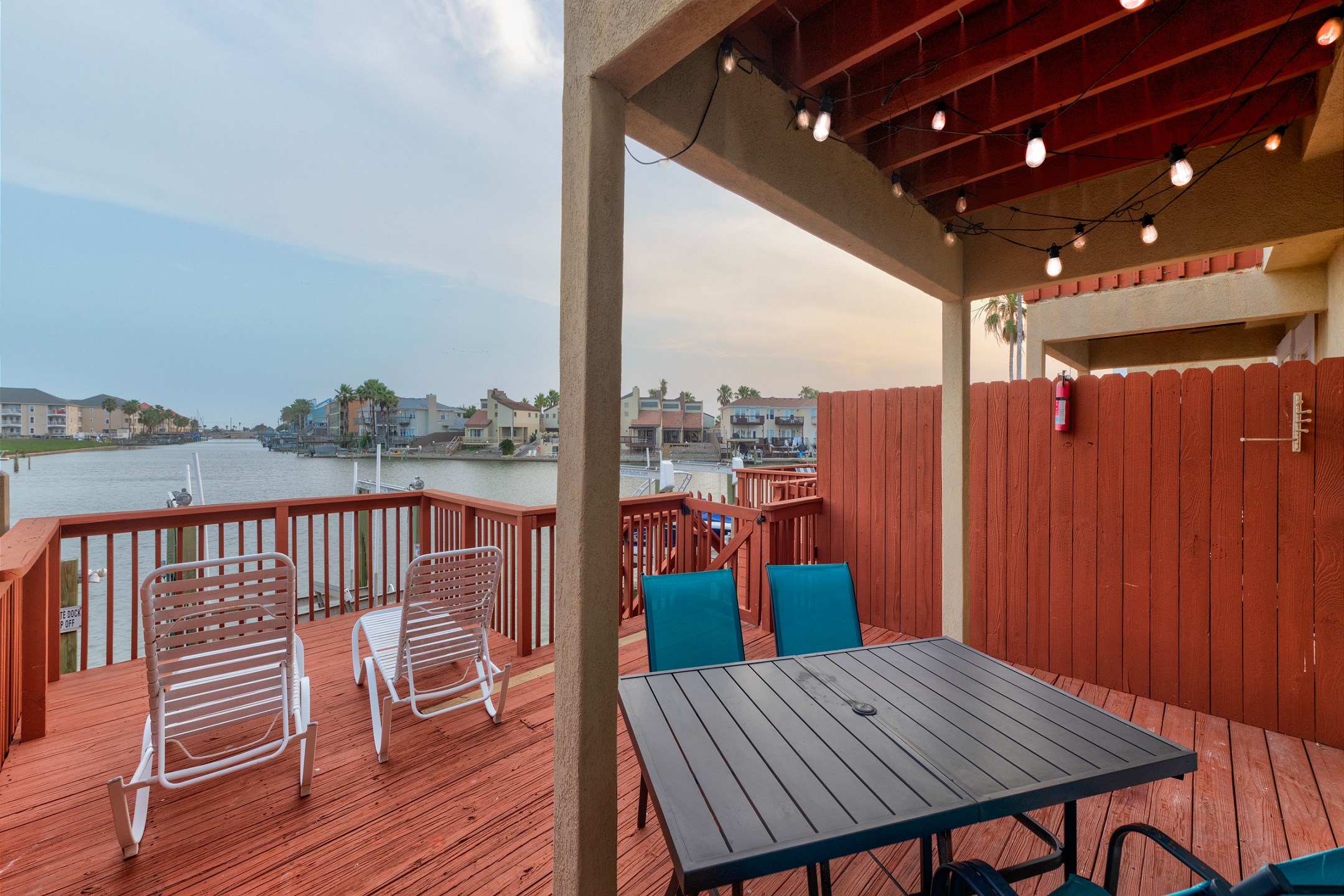 Step right off the living room onto the balcony, where you’ll find outdoor dining—perfect for unwinding or savoring your catch of the day.