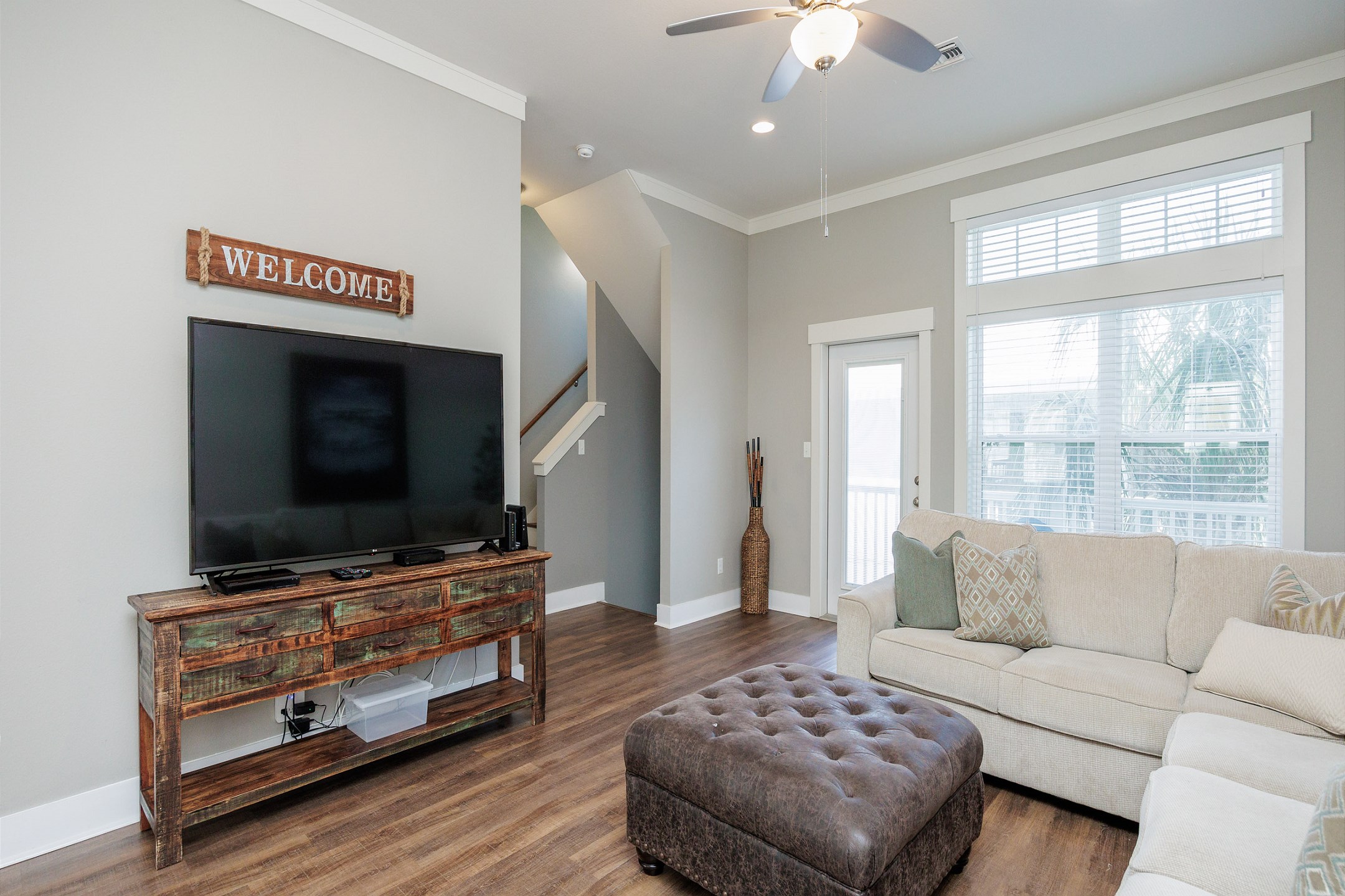 Living area with flat screen TV to enjoy while relaxing on the cozy couch