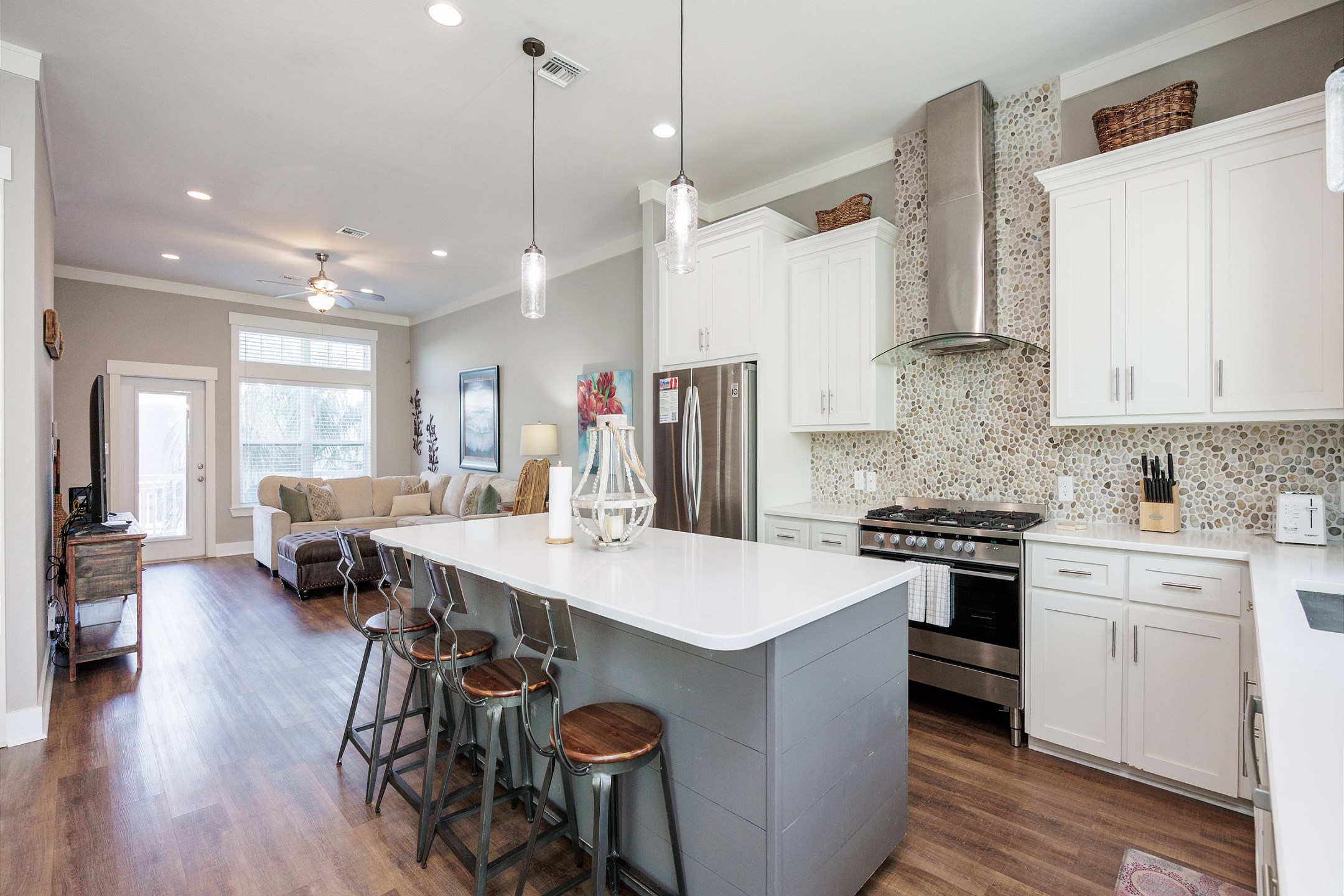 Open concept kitchen, living, and dining area located on second floor 