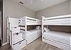 Fifth bedroom on the second floor with two sets of twin over twin size bunk beds with twin trundle