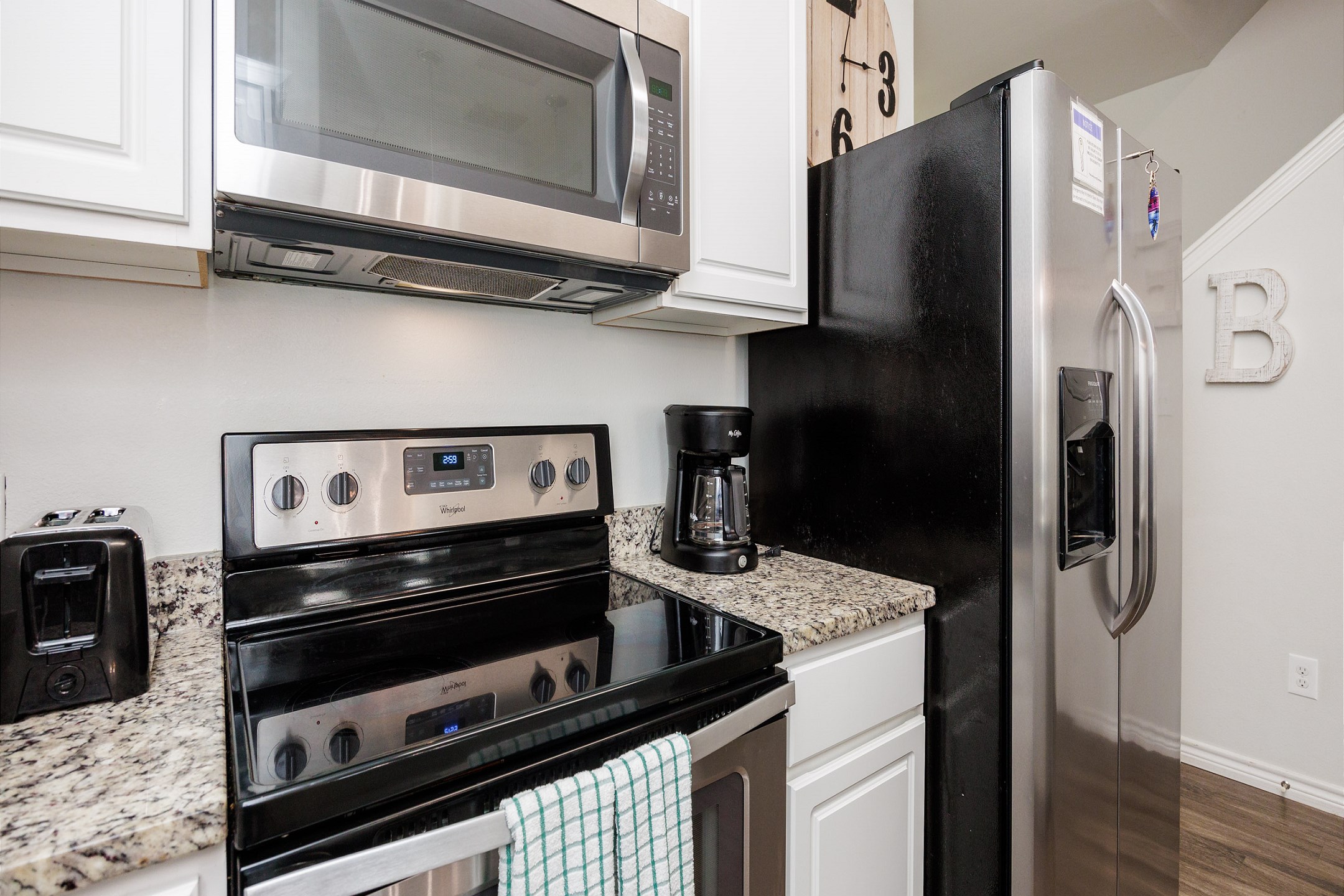 Cookware, utensils, and dinnerware for guest use