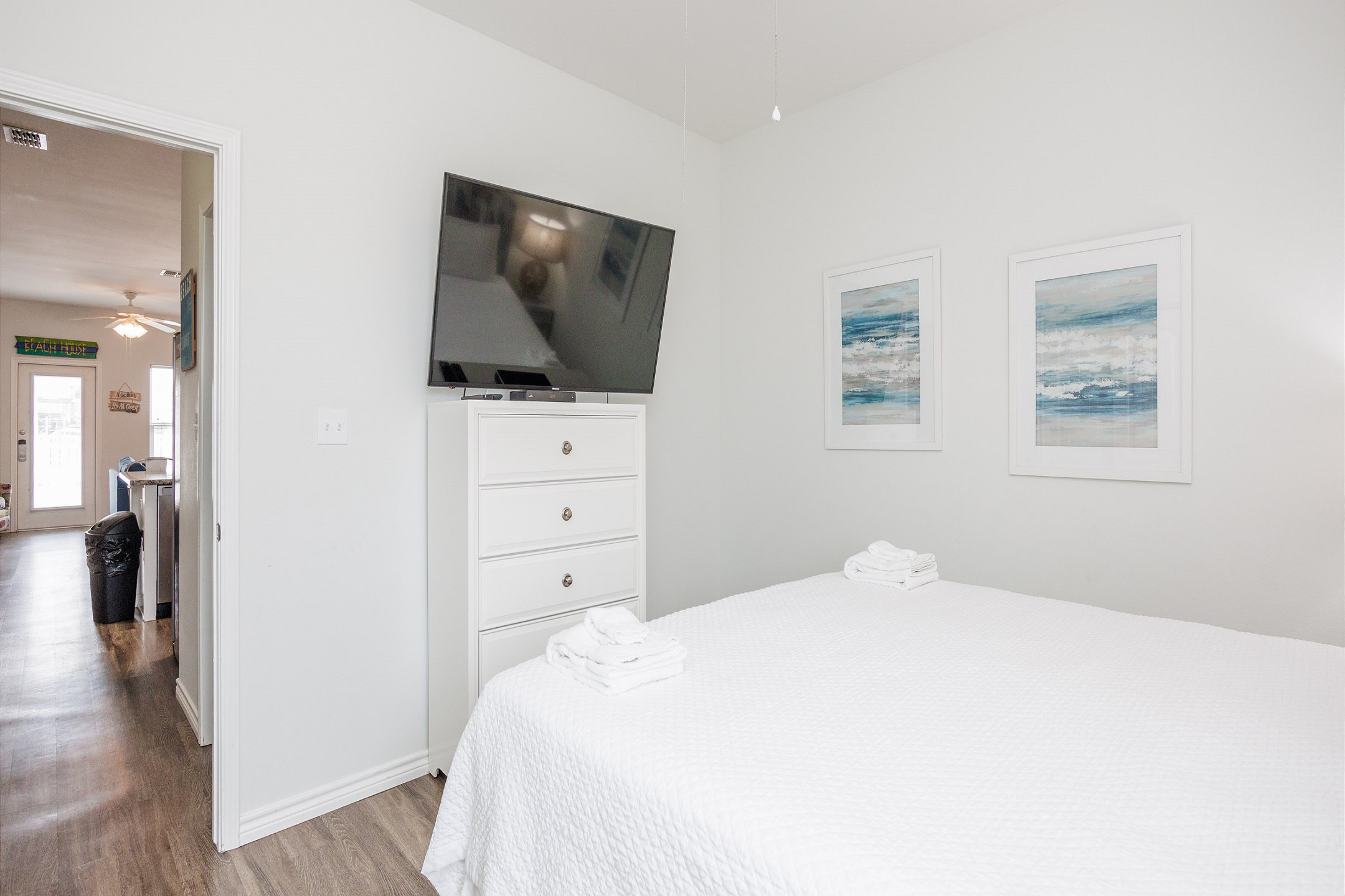 Master bedroom on the first floor with king size bed and flat screen TV