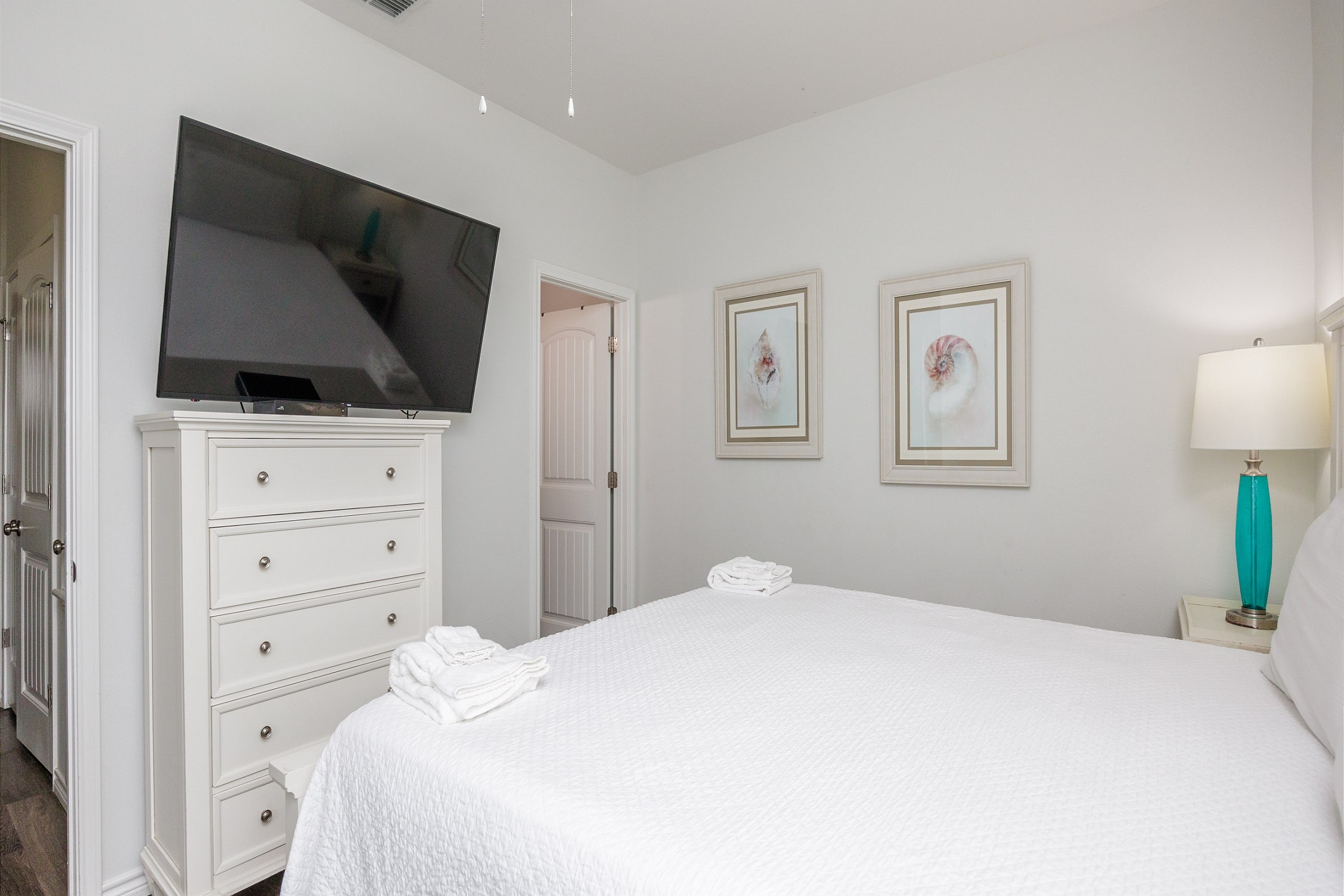 Second bedroom on the second floor with king size bed, private bathroom and flat screen TV 