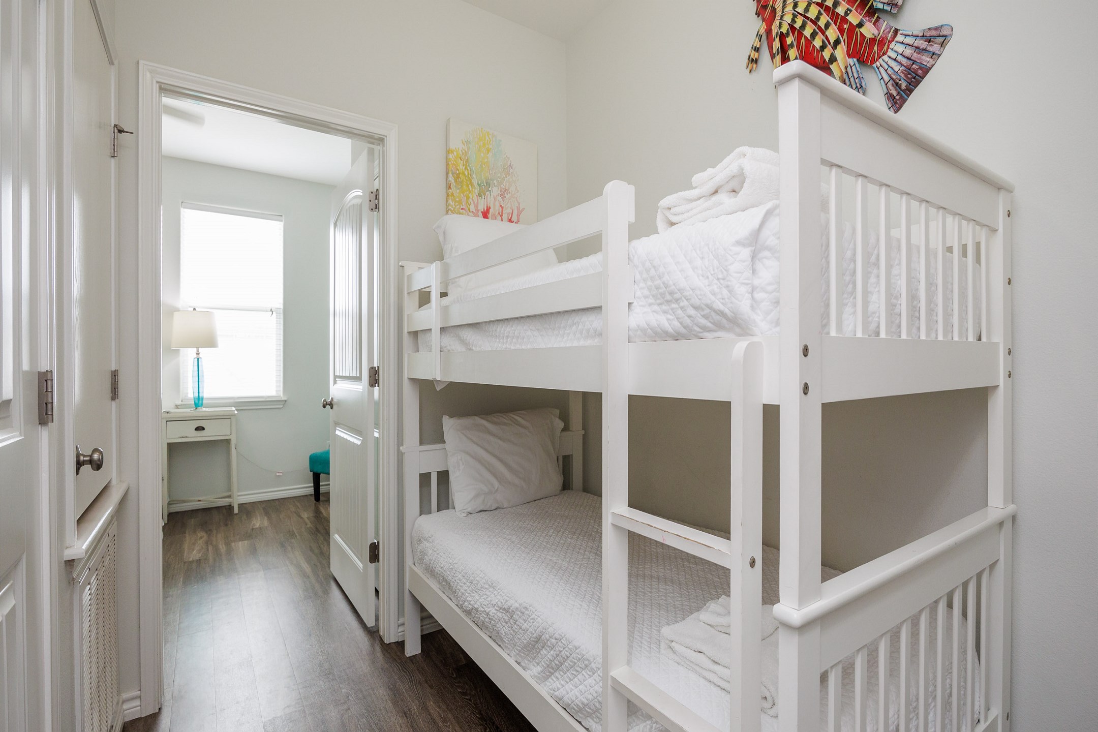 Hallway nook on the second floor with twin over twin size bunk beds 
