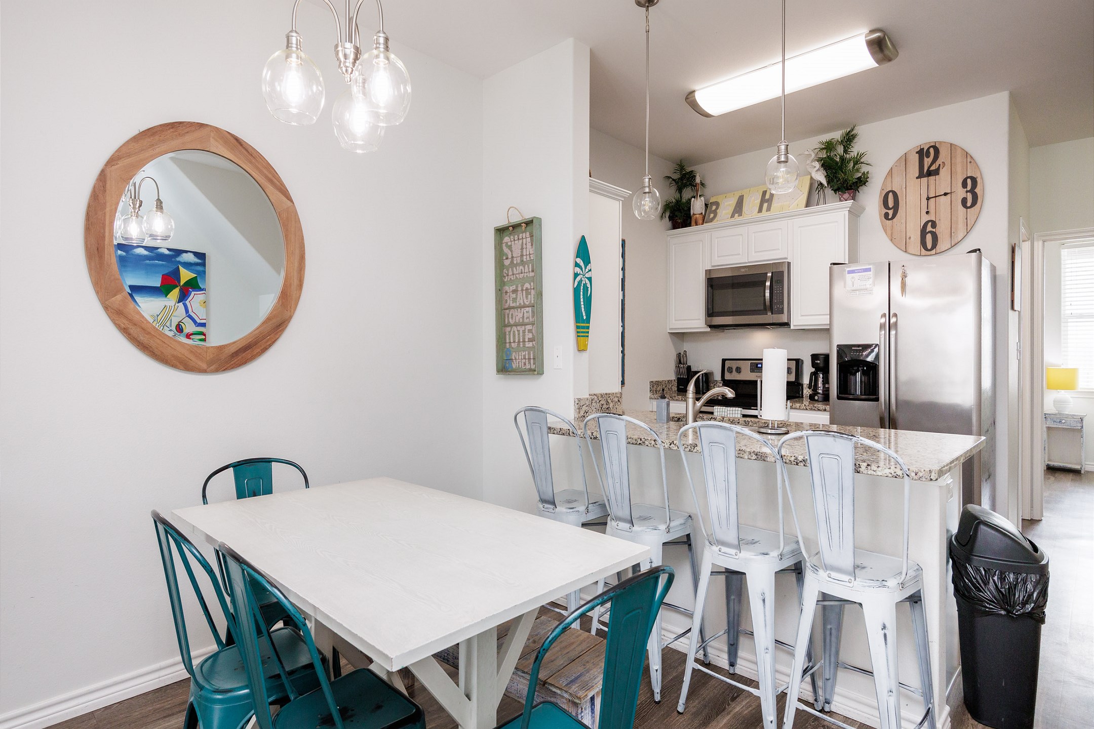 Dining area, breakfast bar, and well-equipped kitchen 
