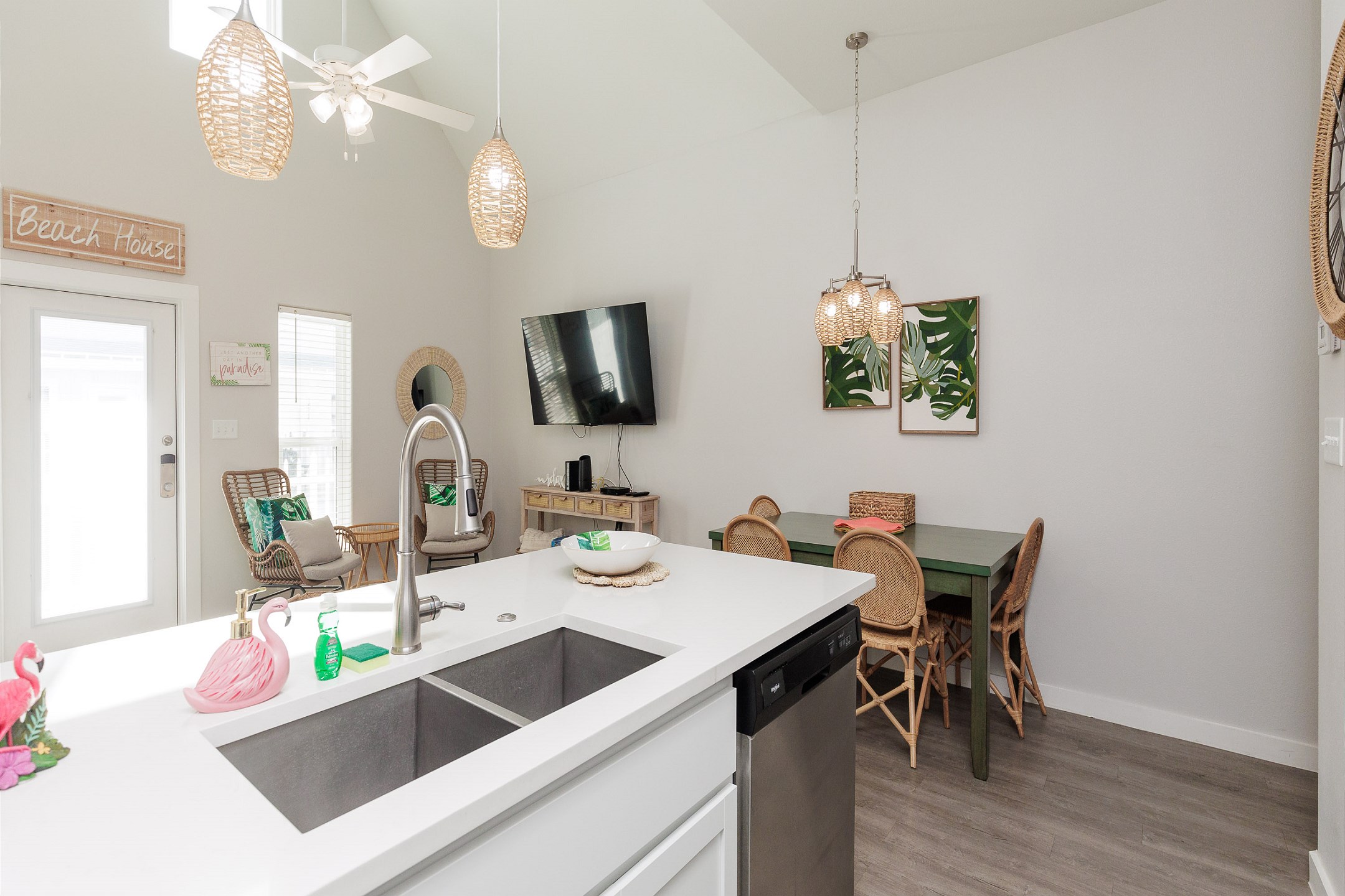 Open-concept layout connecting the dining and living areas to the kitchen