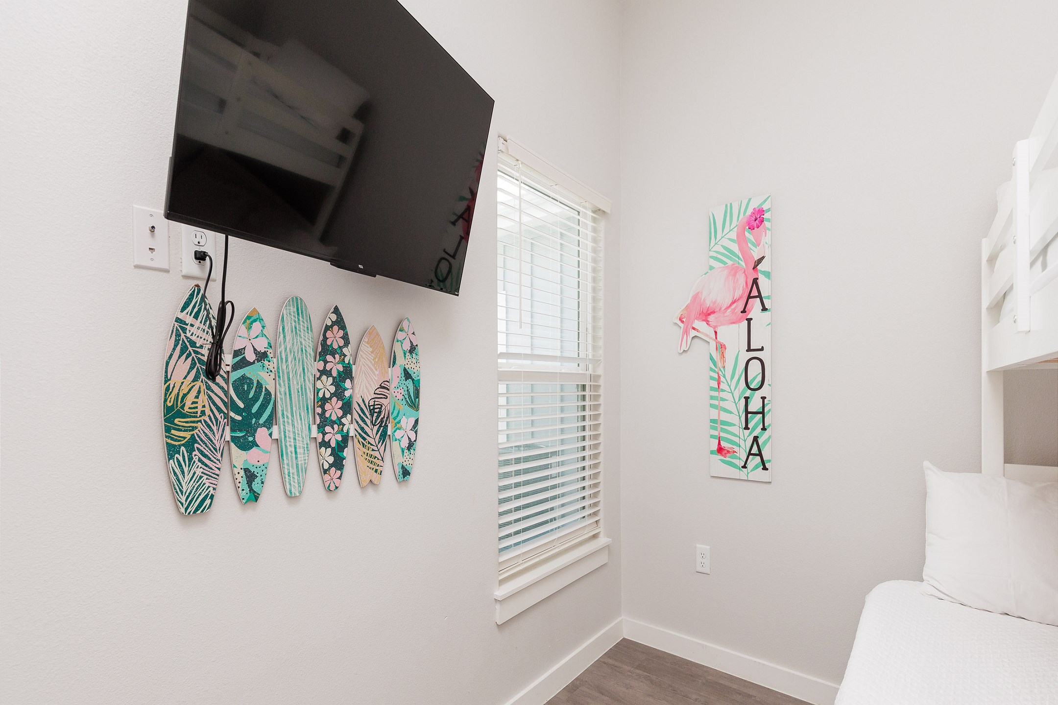 Second bedroom features a twin over full size bunk bed with a twin trundle and flat-screen TV