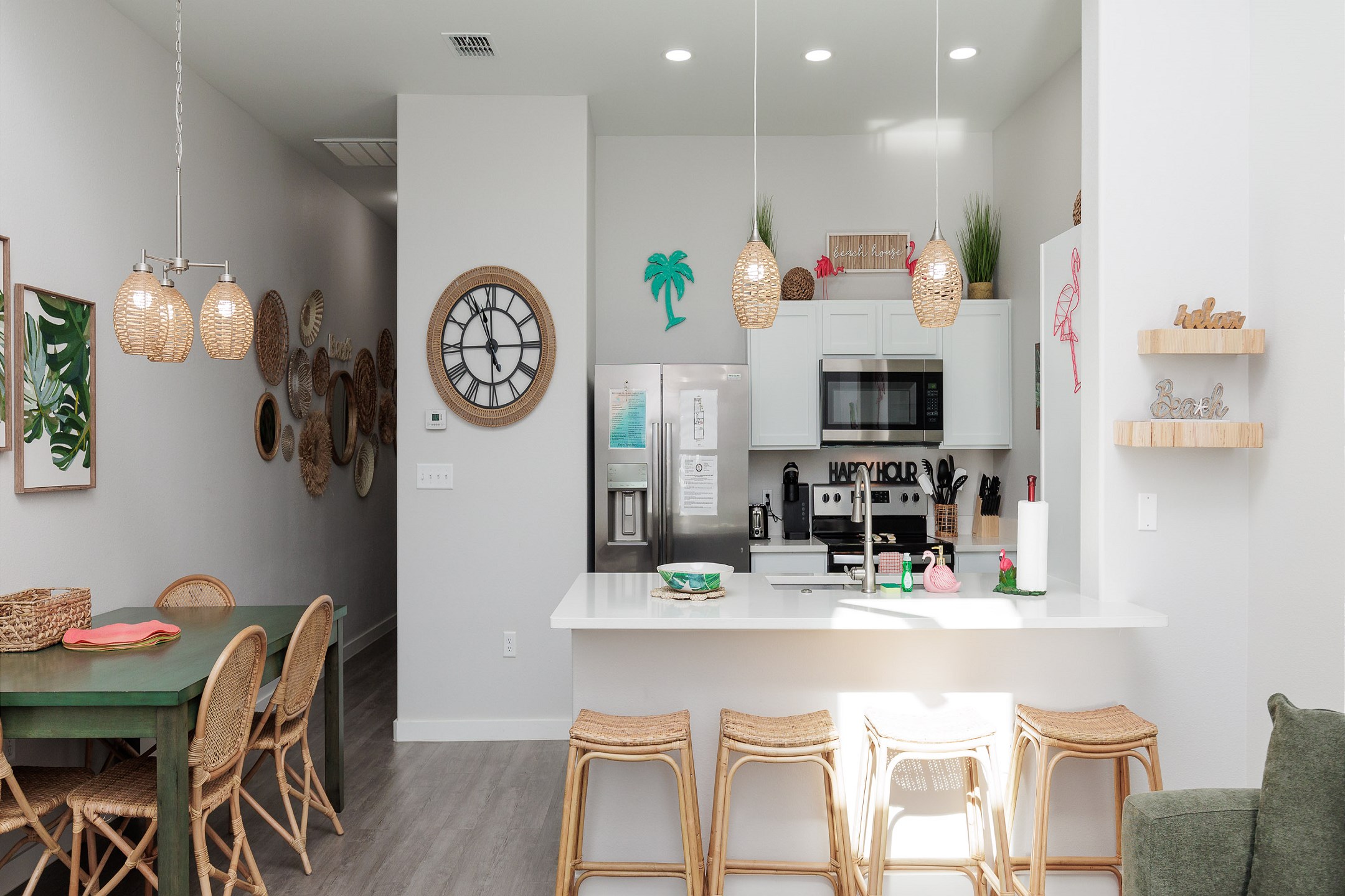 Dining table and breakfast bar with easy access to the gourmet kitchen
