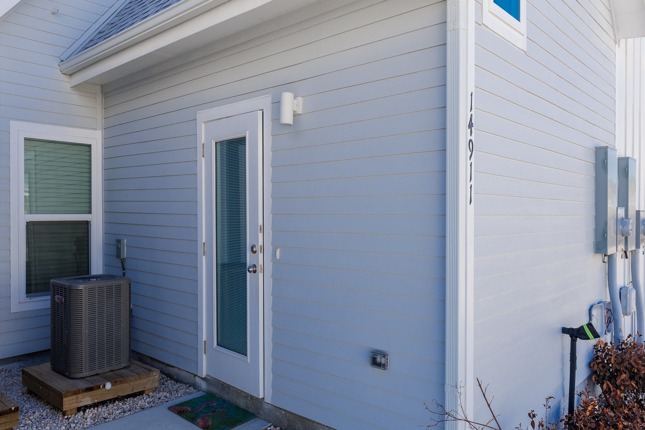 Back door from the reserved parking spots into the master bedroom