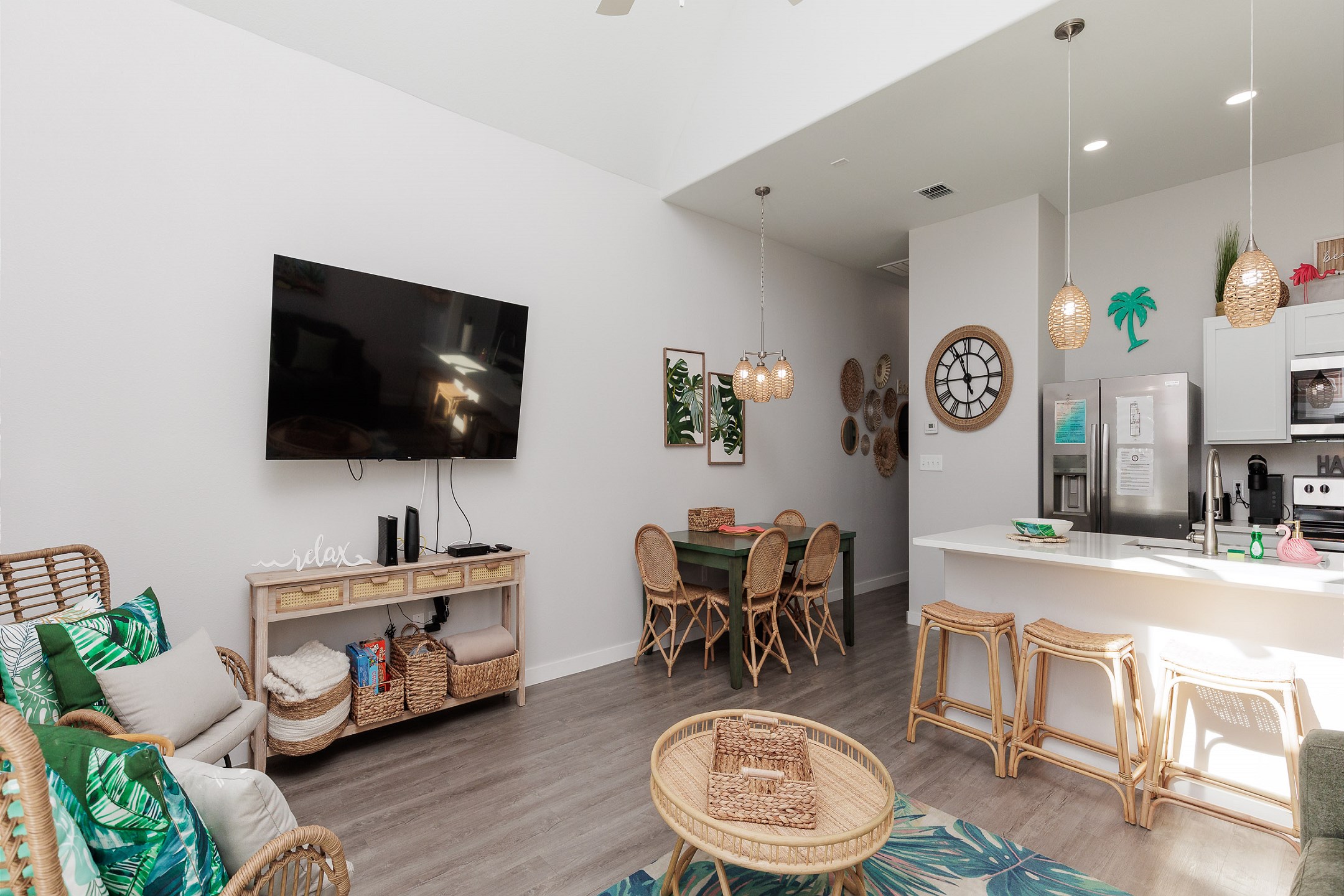 Modern entertainment haven boasting a state-of-the-art TV, streaming services, and comfortable lounging options for movie nights