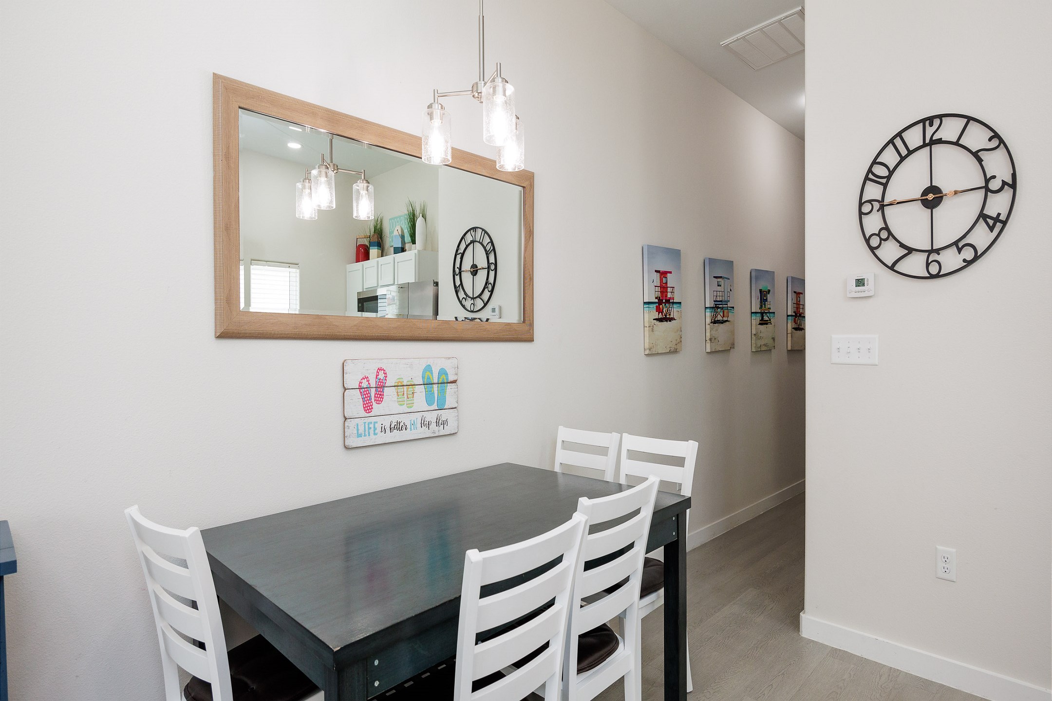 Dining area with seating for six with four chairs and one bench