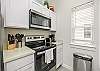 Fully equipped kitchen with stainless steel appliances 