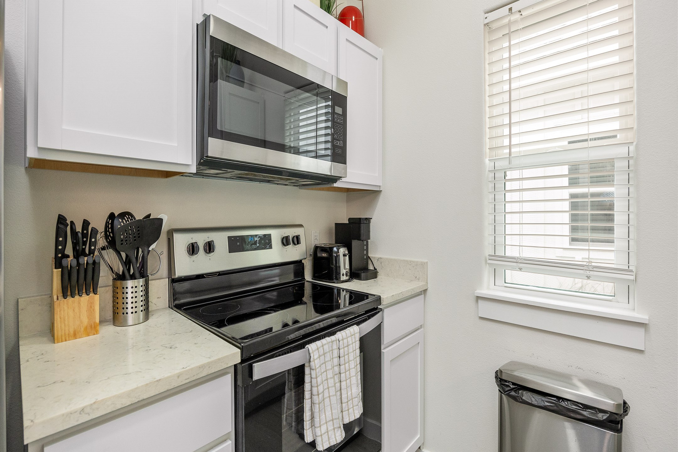 Well equipped kitchen with stainless steel appliances 
