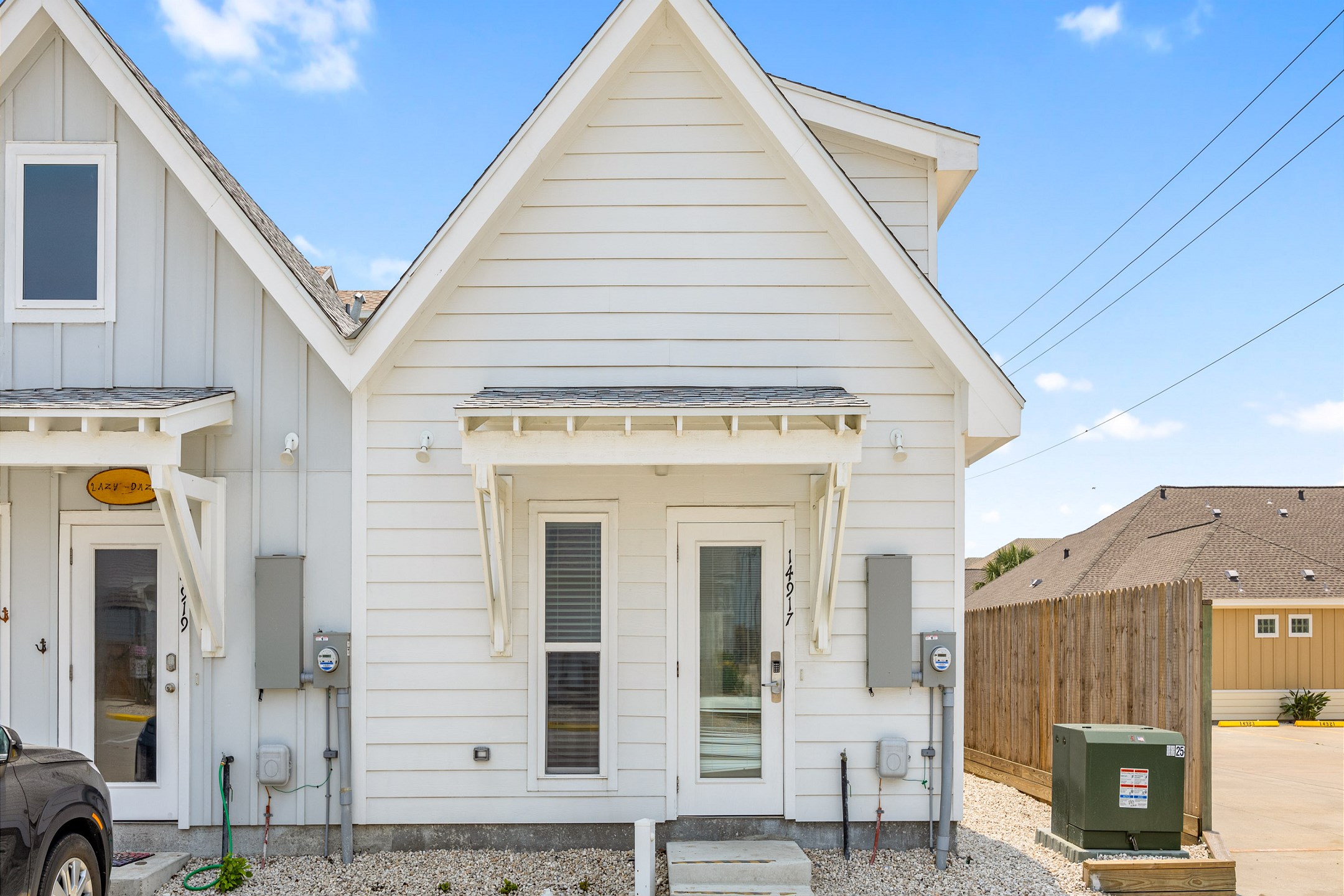 View of the exterior of the property with two reserved parking spots right outside your door parking 