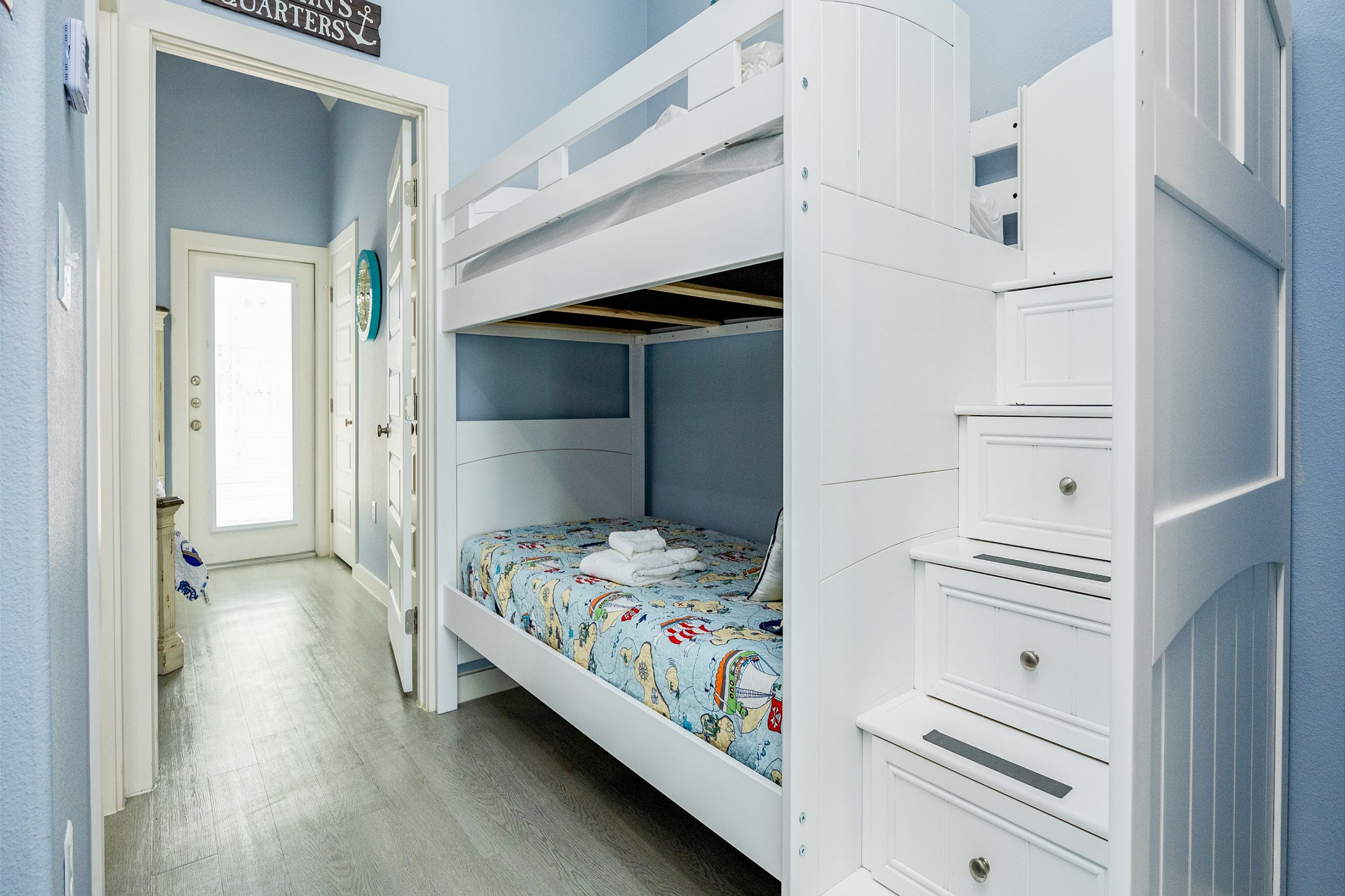 Charming hallway nook with twin bunk beds