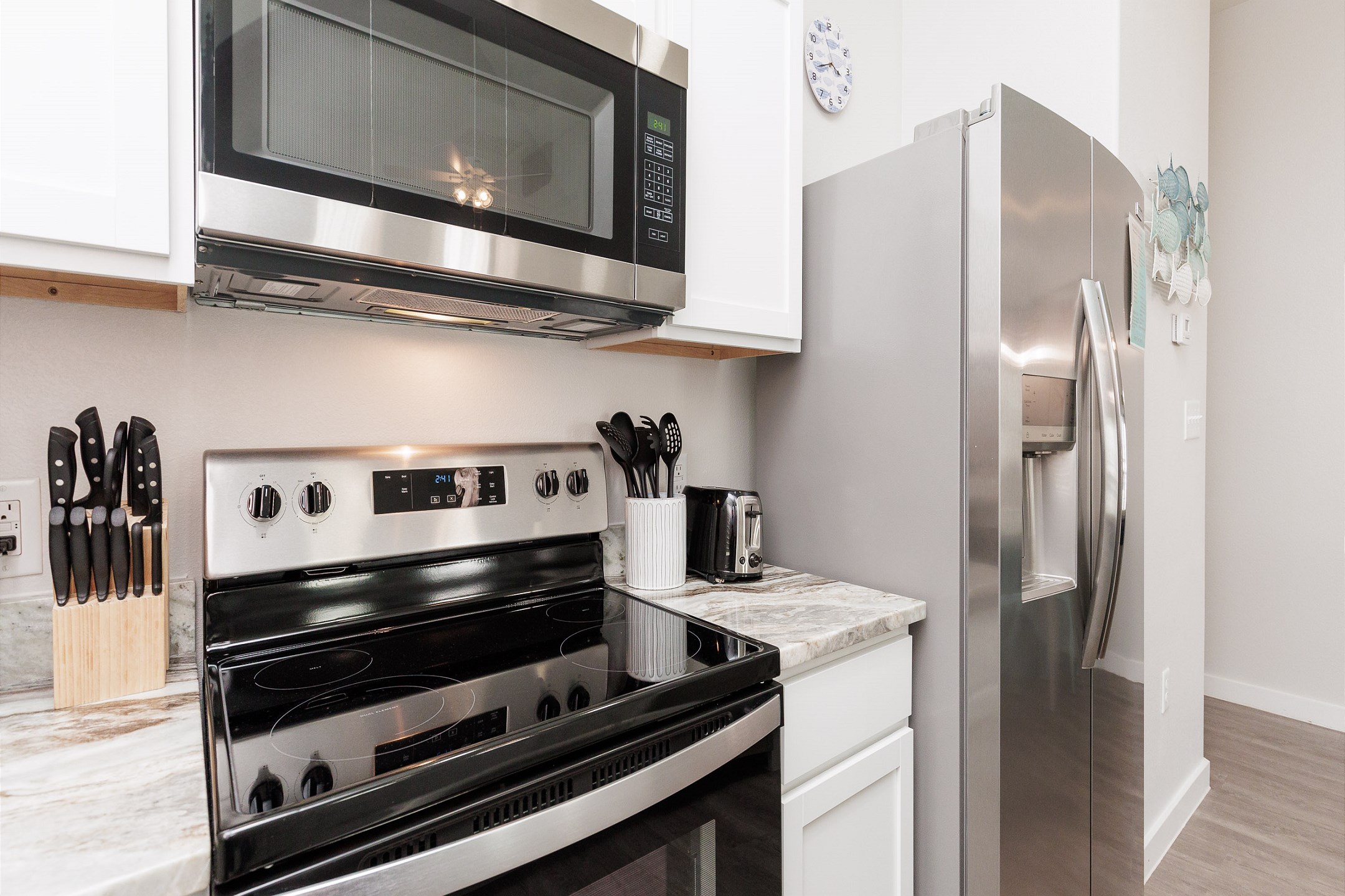 Experience culinary charm in this cozy kitchen, where efficiency meets elegance