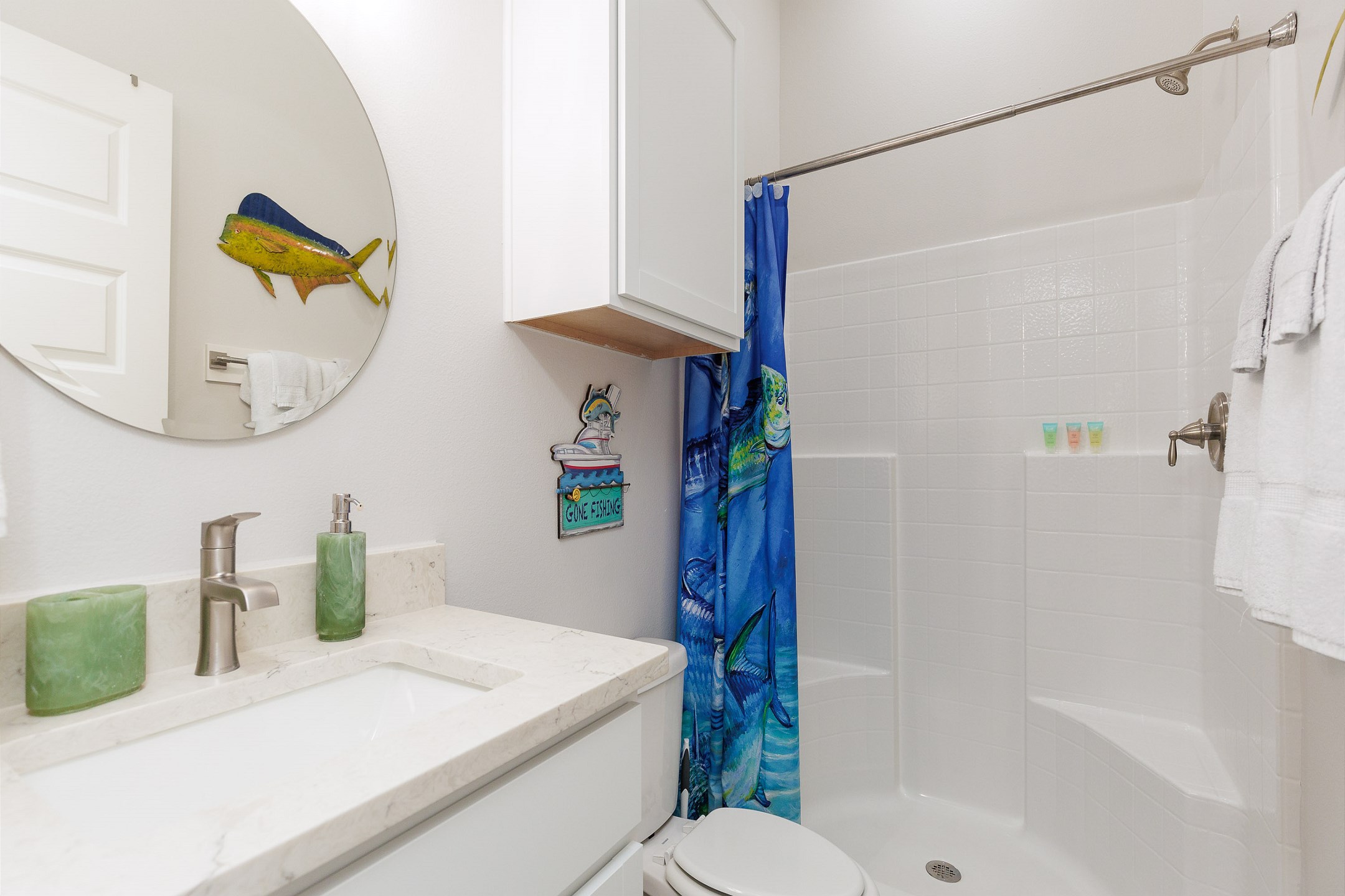 Guest bathroom off hallway with walk-in shower 