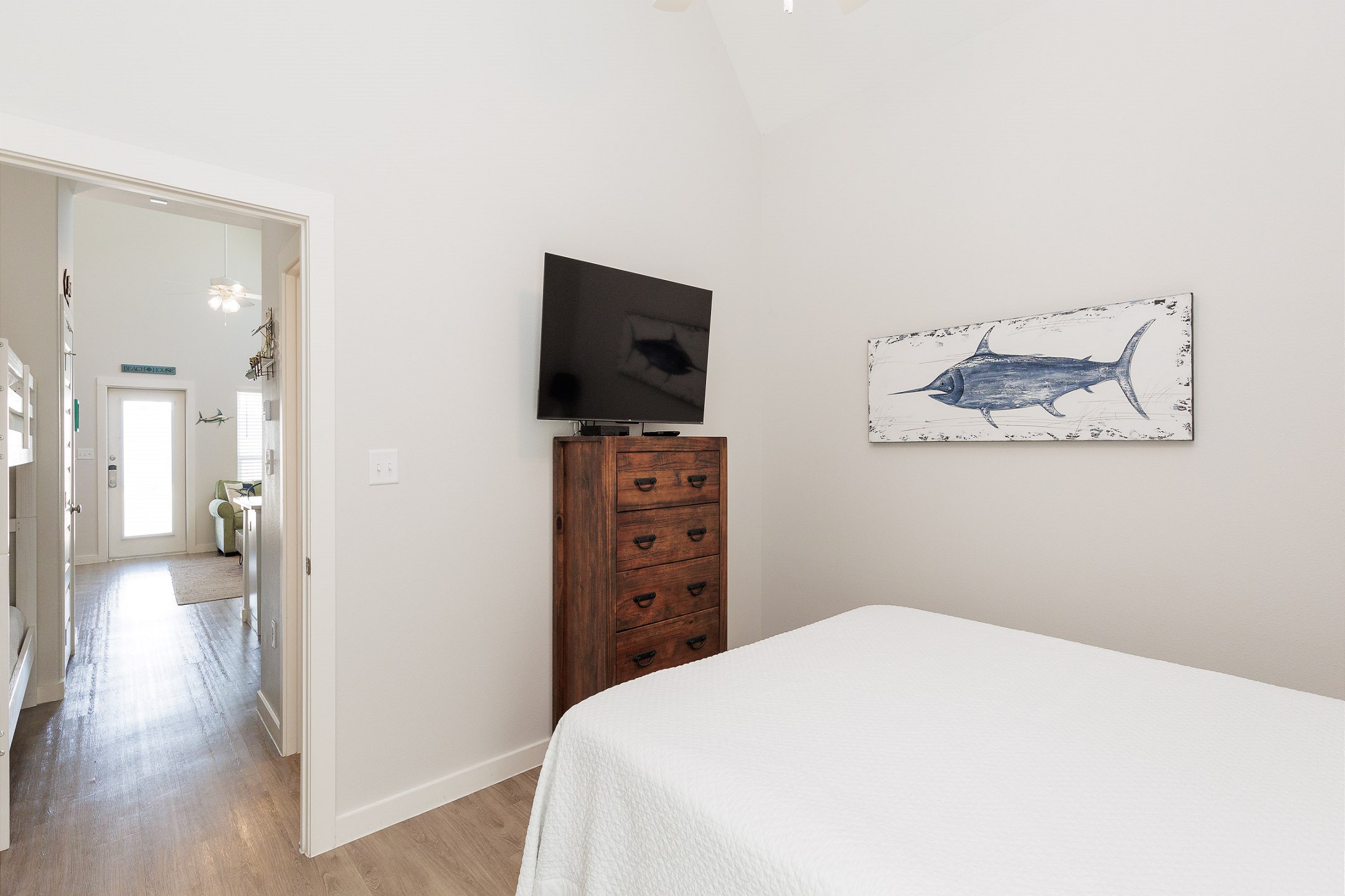Master bedroom with king size bed and flat screen TV