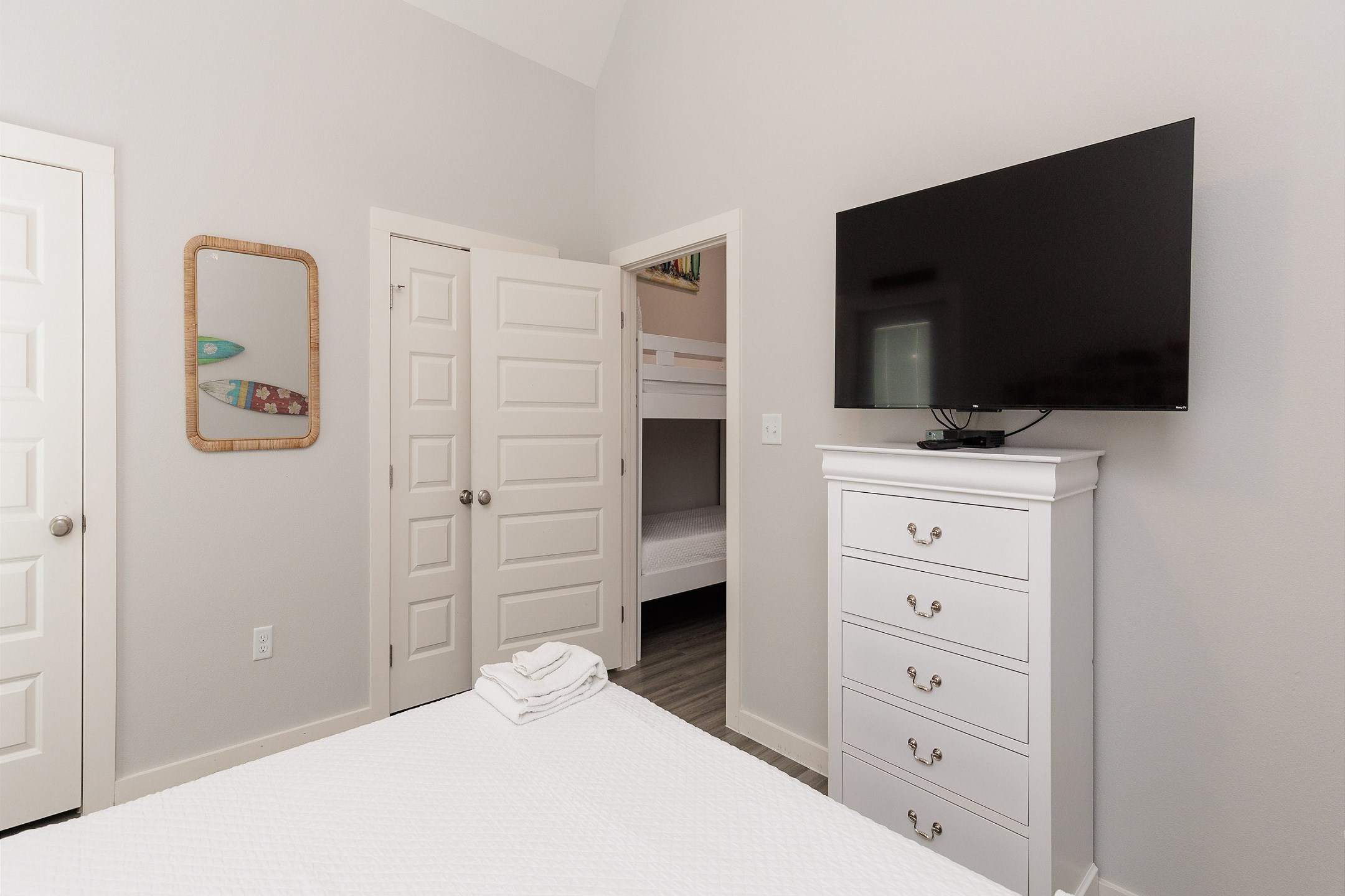 Master bedroom with king size bed and flat screen TV