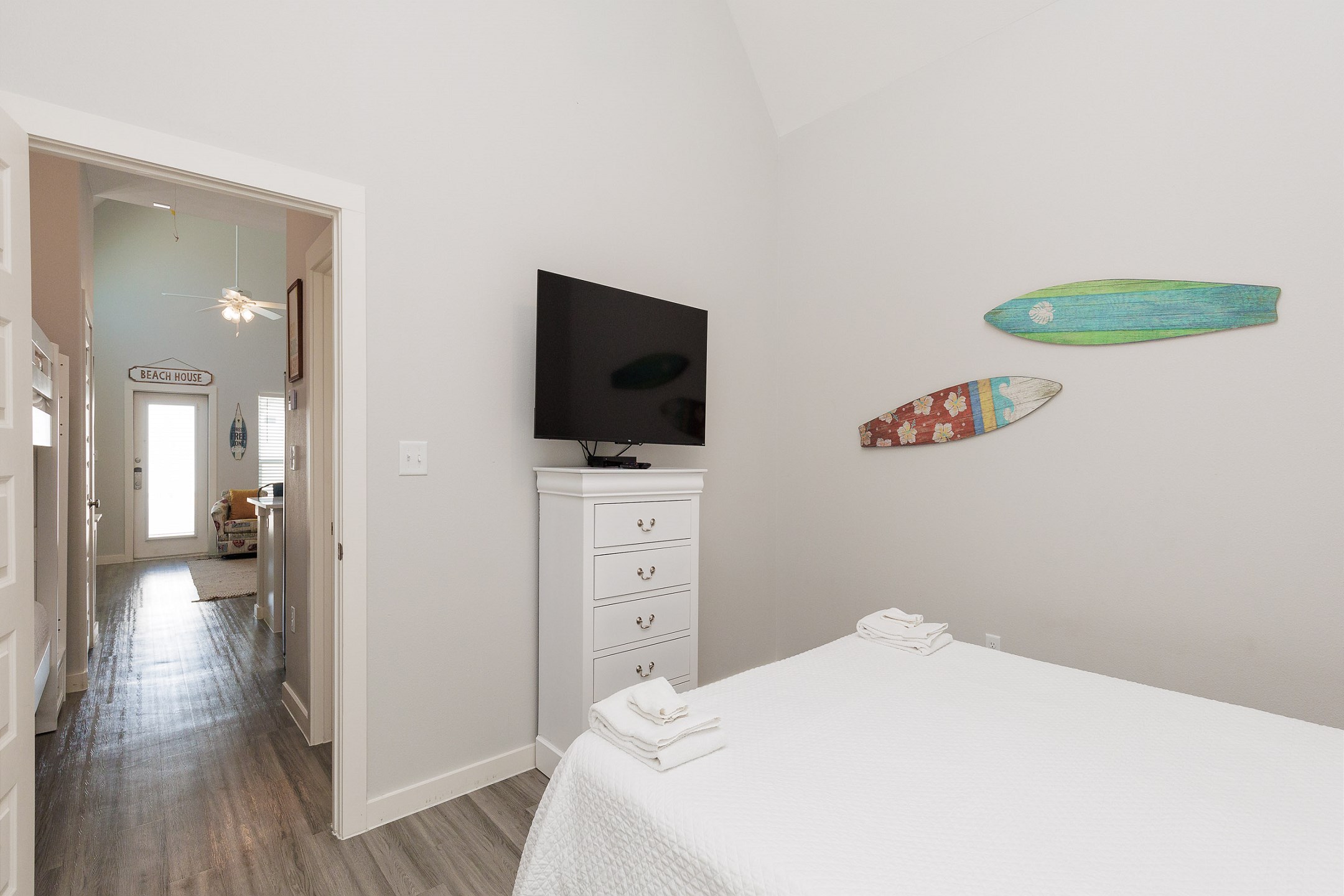 Master bedroom with king size bed and flat screen TV