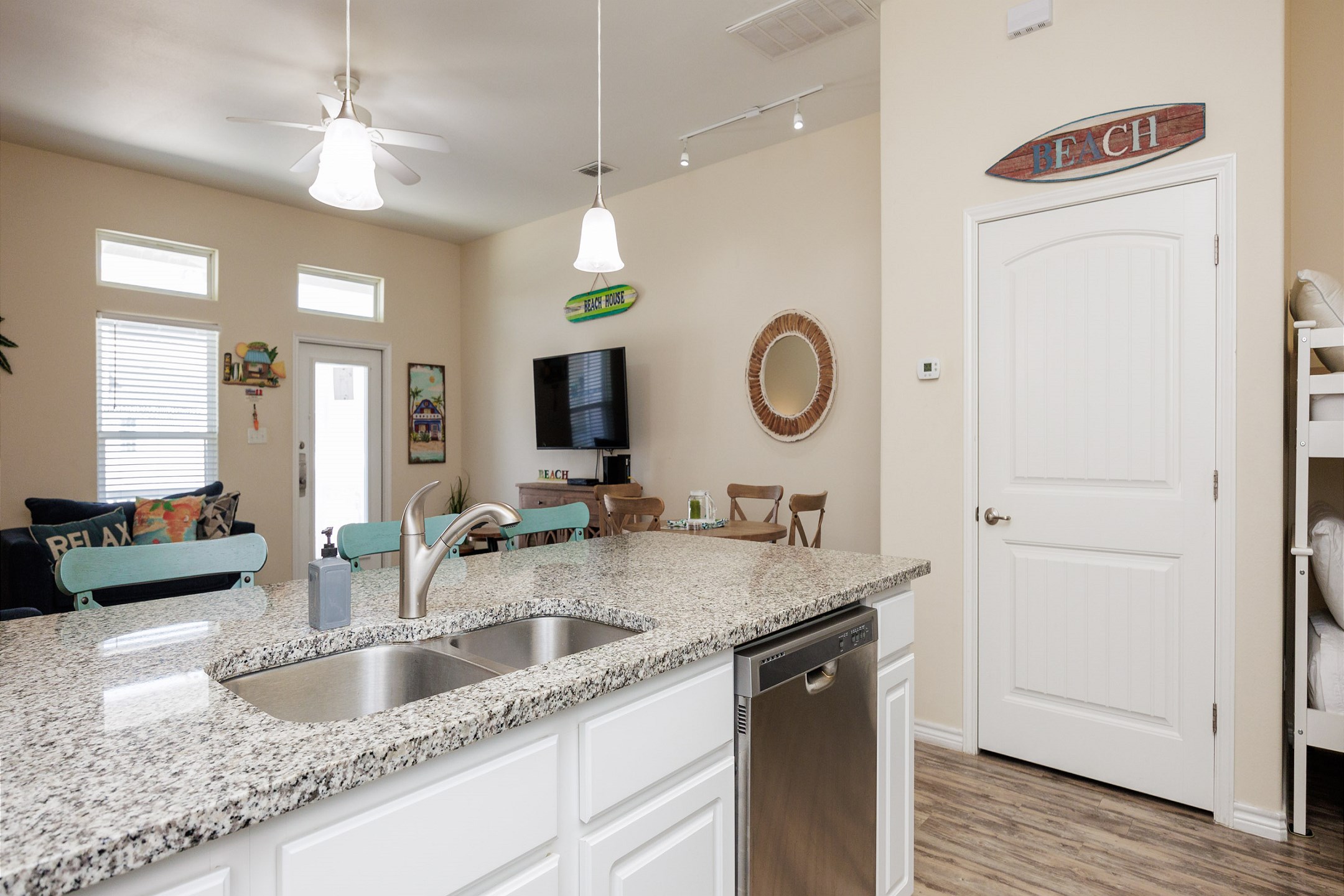 Contemporary kitchen featuring elegant granite countertops and plenty of room for culinary creations