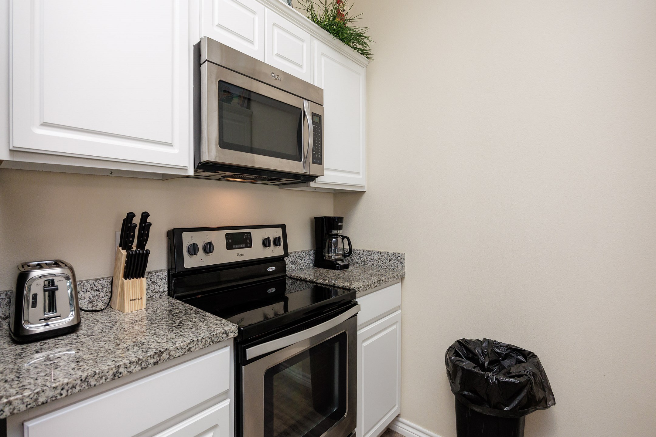 Fully equipped kitchen with stainless steel appliances 