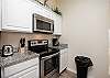 Fully equipped kitchen with stainless steel appliances 