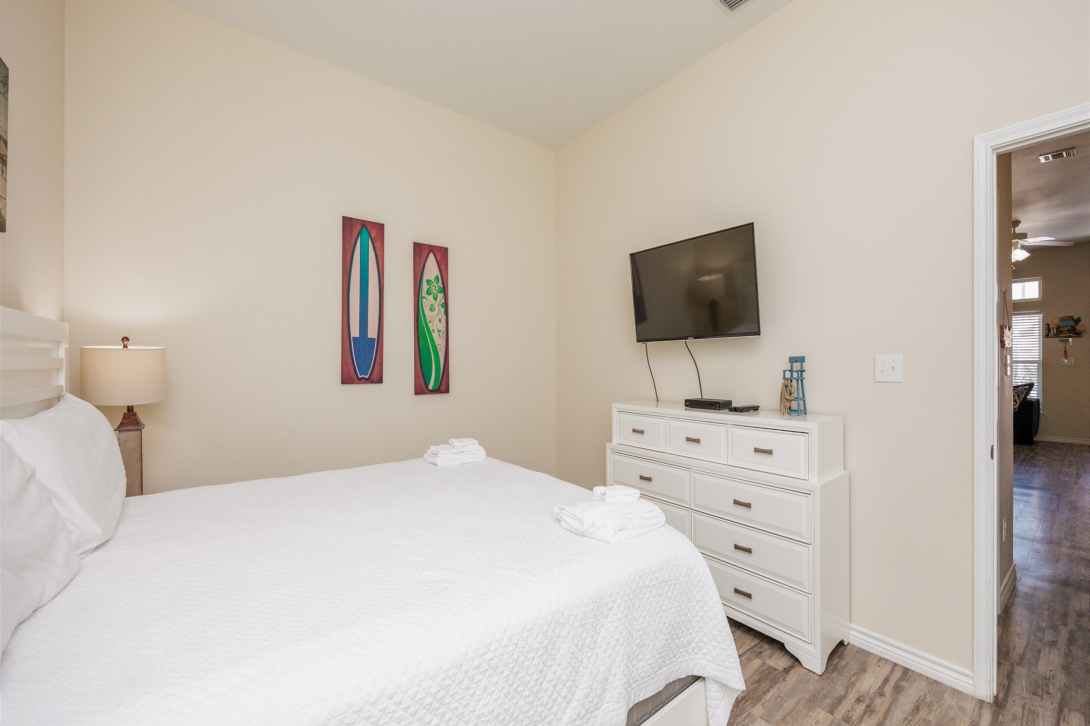 Master bedroom with king size bed and flat screen TV