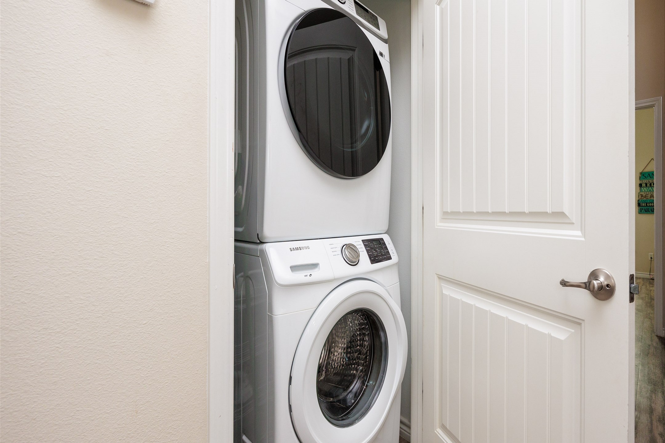 Washer and dryer in hallway for added convenience during your stay 